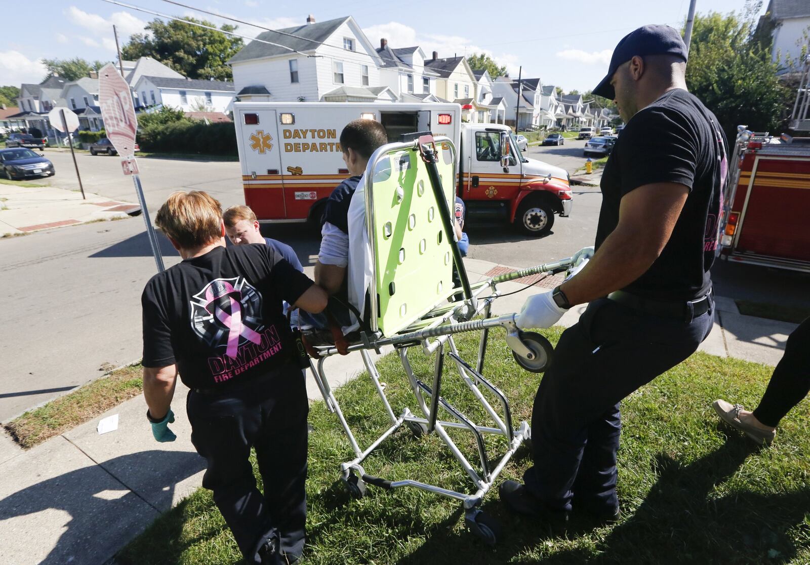 In October, Dayton Fire Department medics prepare to transport an overdose patient who was revived with Narcan to a hospital emergency department. Montgomery County residents were treated for overdoses more than 2,200 times during 2016. CHRIS STEWART / STAFF