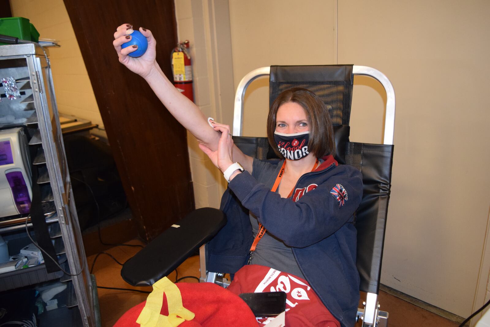 Julie Wuebker gives blood during a drive at St. Michael’s Hall on Wednesday at Fort Loramie. CONTRIBUTED