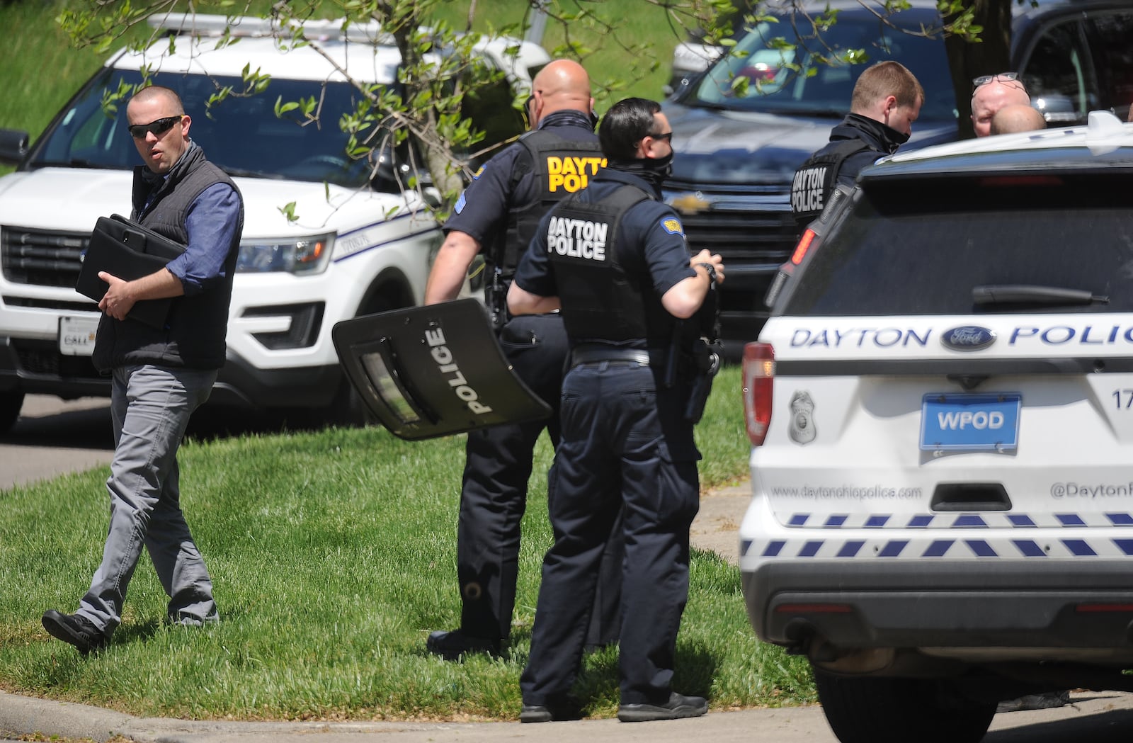 One person was taken to the hospital with non-life-threatening injuries following a shooting on Moraine Avenue in Dayton Friday afternoon. MARSHALL GORBY/STAFF