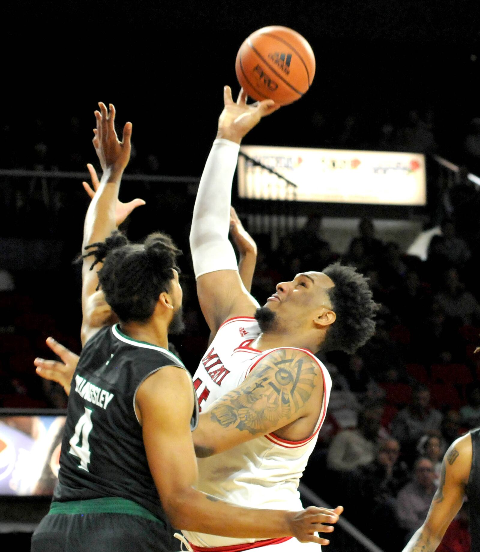 Miami's Anderson Mirambeaux, 45, shoots over Eastern Michigan's Jalin Billingsley, 4, during the first half of a Mid-American Conference game at Millette Hall on Saturday, Jan. 28, 2023. DAVID A. MOODIE/CONTRIBUTING PHOTOGRAPHER