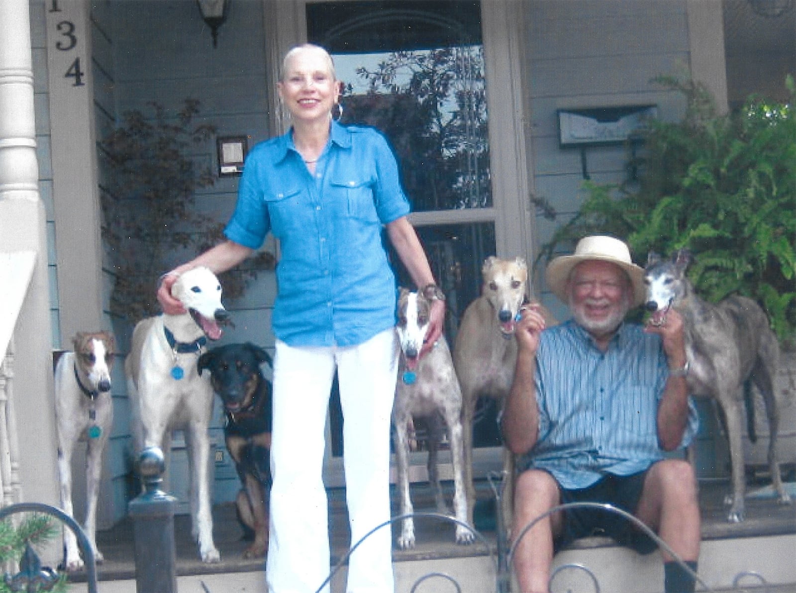 Johnson (Right) and his wife Teresa and some of their fostered and rescued greyhound dogs. Though they only have one dog now, they spent many years saving these dogs and giving them a good home.