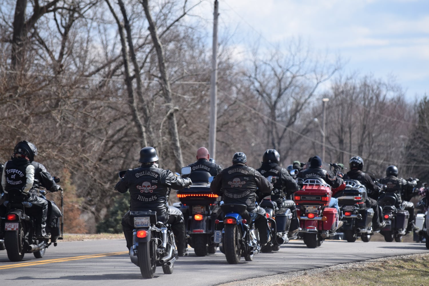 PHOTOS: Thousands of Outlaws attend motorcycle gang leaders funeral at Montgomery County Fairgrounds.