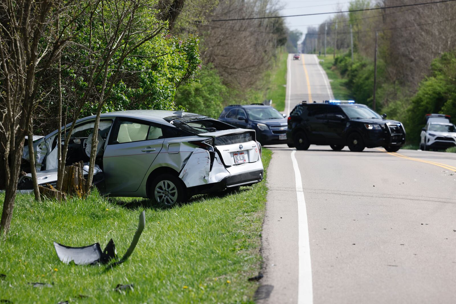 Three people sustained minor injuries after a crash at the intersection of Diamond Mill and Air Hill roads. | JIM NOELKER/STAFF