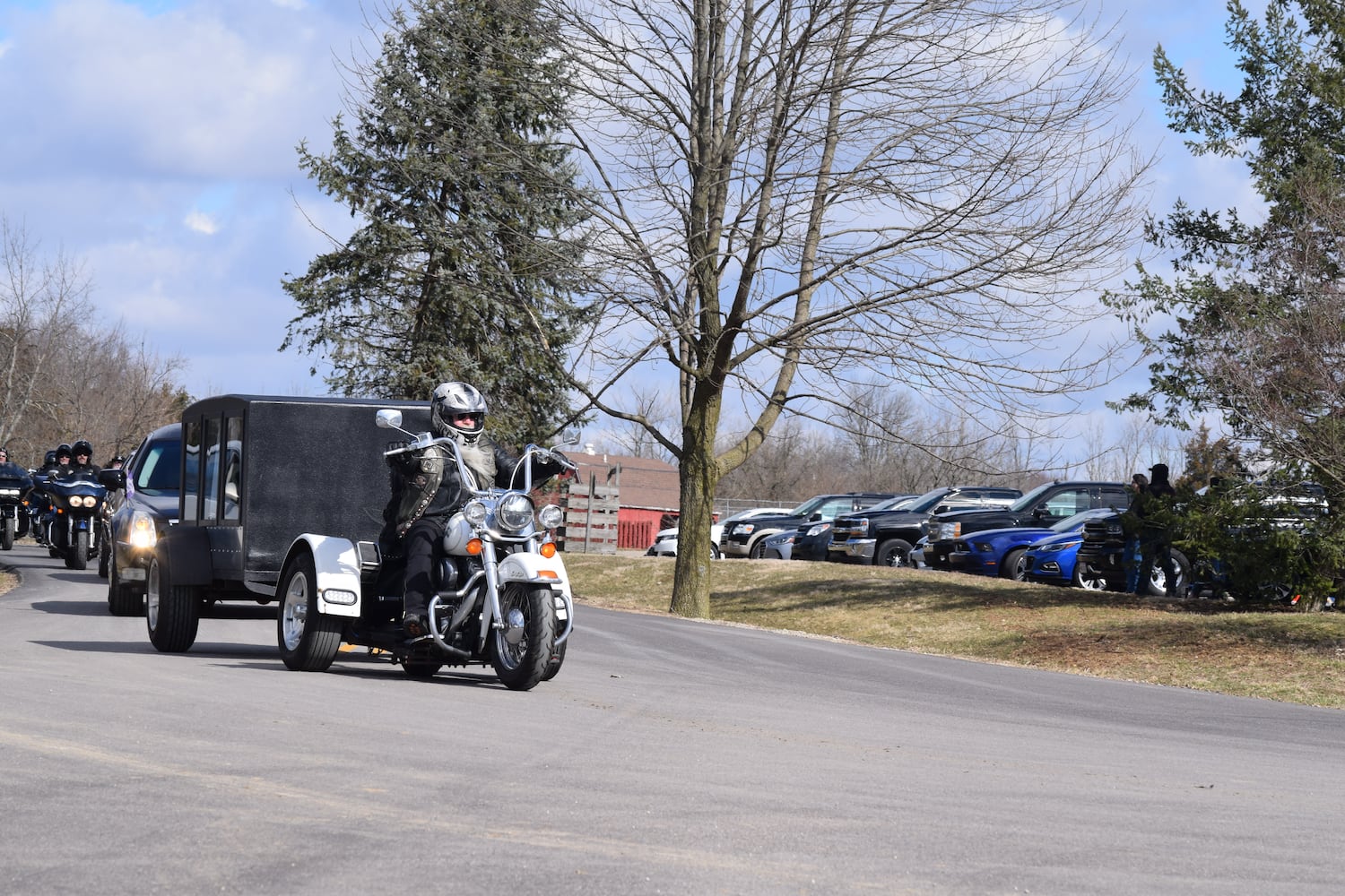 PHOTOS: Thousands of Outlaws attend motorcycle gang leaders funeral at Montgomery County Fairgrounds.