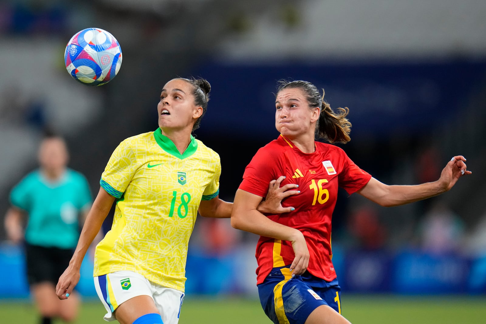 FILE - Brazil's Gabi Portilho, left, and Spain's Laia Codina battle for the ball during a women's semifinal soccer match between Brazil and Spain at the 2024 Summer Olympics, Tuesday, Aug. 6, 2024, at Marseille Stadium in Marseille, France. (AP Photo/Julio Cortez, File)