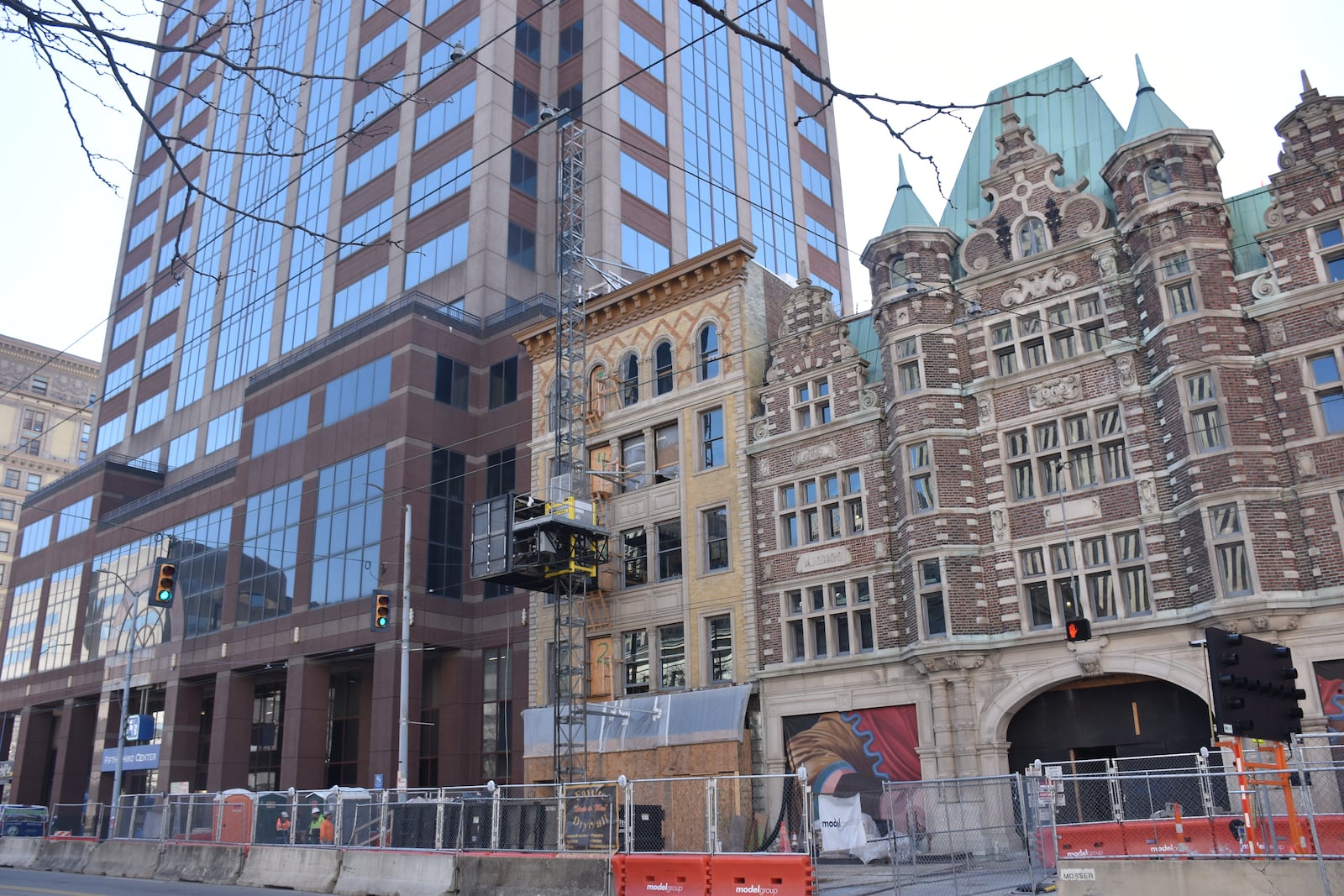 Construction continues on the northern section of the Dayton Arcade in downtown Dayton. A walkway connecting the adjacent Fifth Third Center office tower and a parking garage is temporarily closed for construction. CORNELIUS FROLIK / STAFF