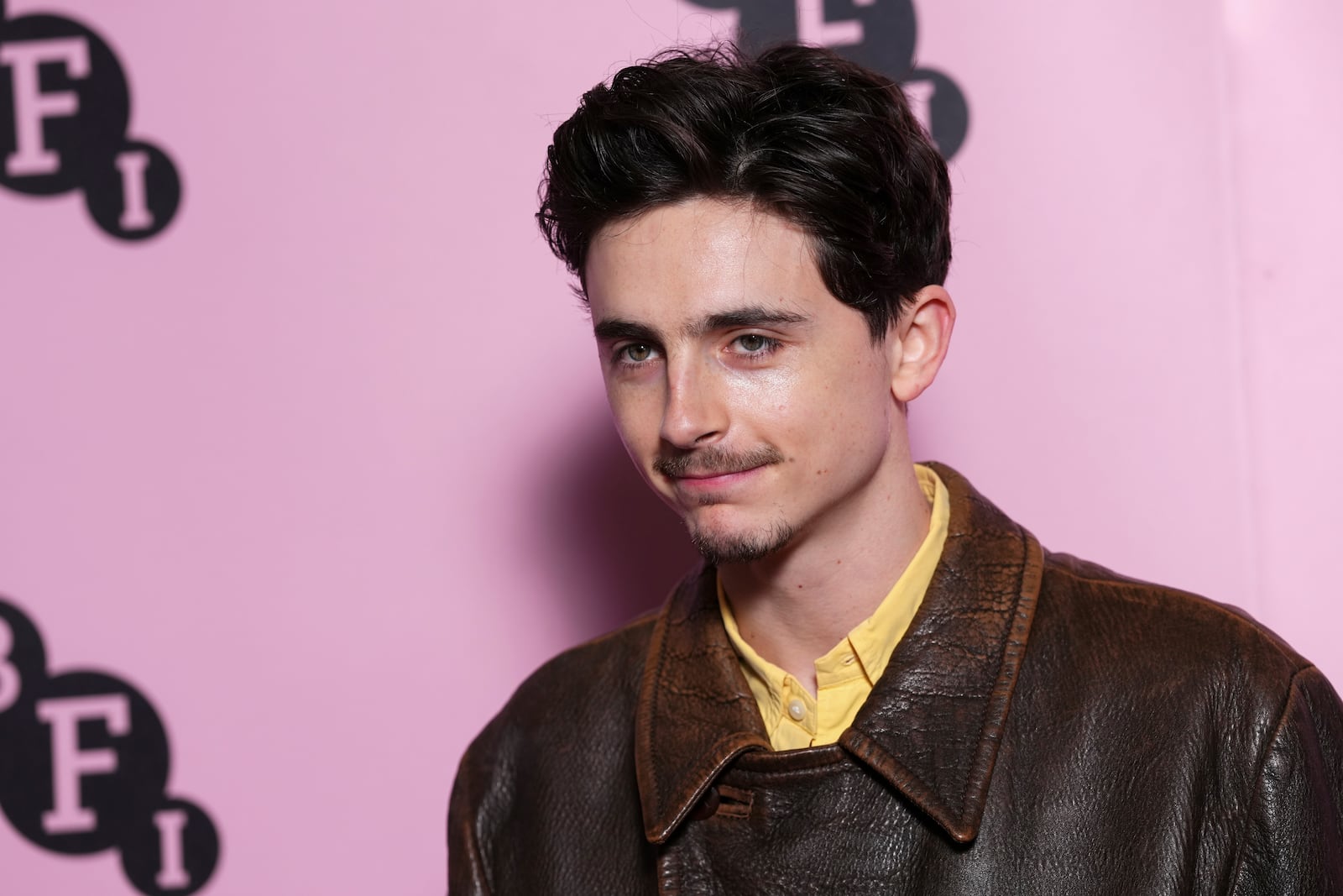 Timothee Chalamet poses for photographers upon arrival at the photo call for an 'In Conversation' event at the BFI Southbank, on Wednesday, Dec. 18, 2024, in London. (Photo by Scott A Garfitt/Invision/AP)