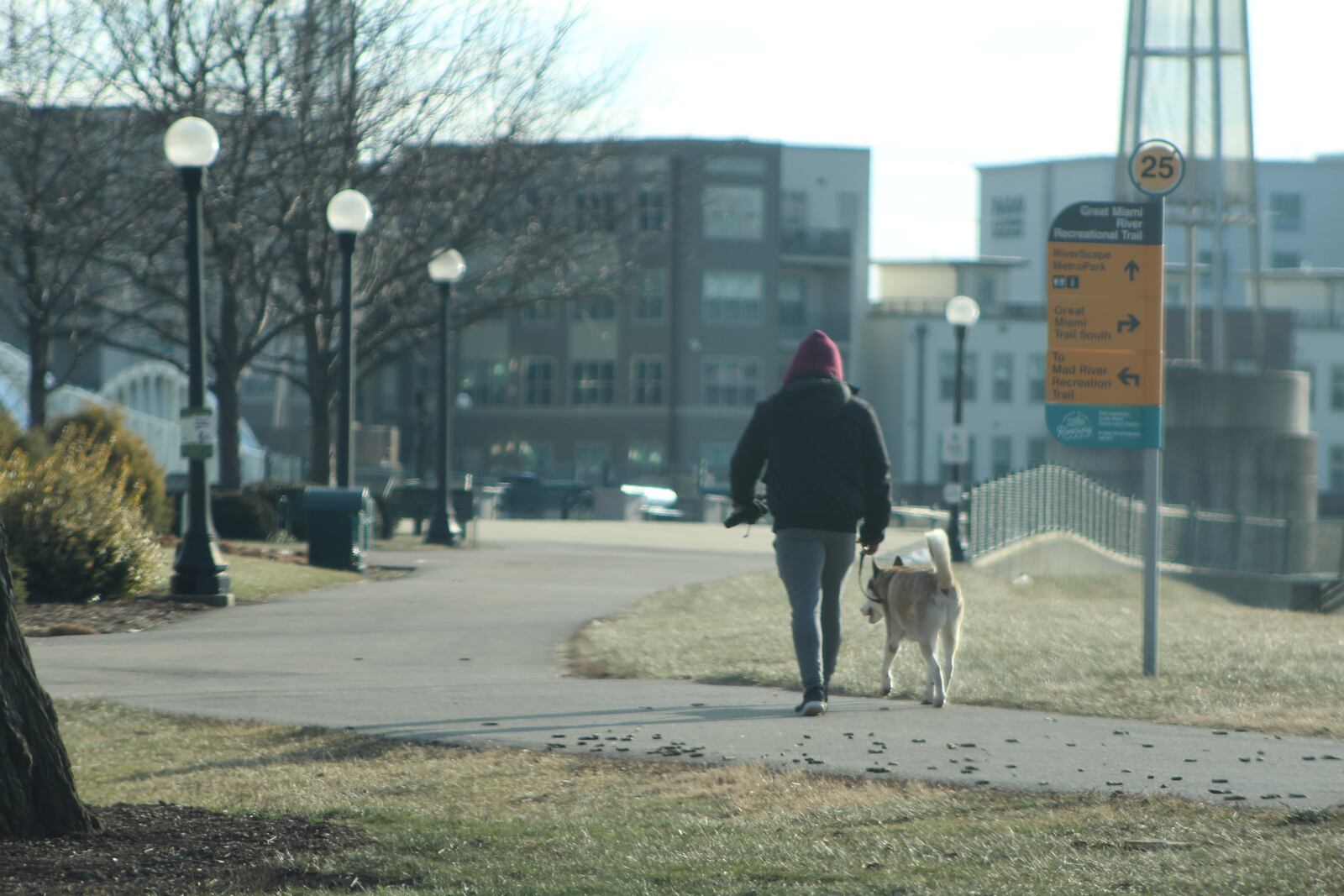 A man and his dog take a walk on a very chilly Friday afternoon at Deeds Point MetroPark. CORNELIUS FROLIK / STAFF