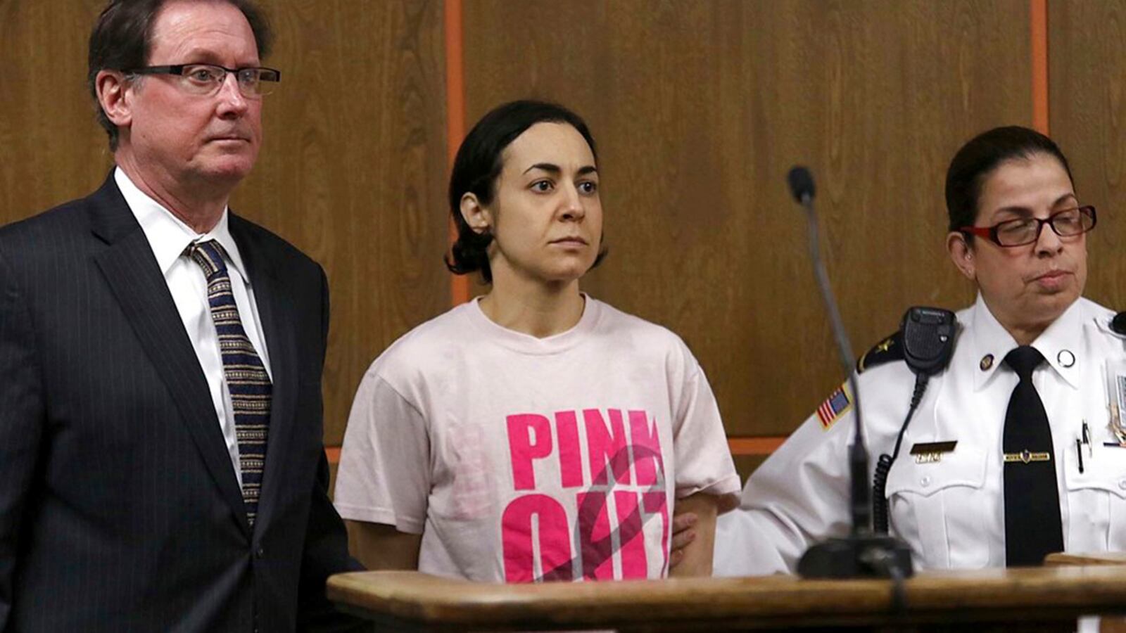 Shana Pedroso appears in Fitchburg District Court on Wednesday, April 11, 2018,  with her attorney Michael Hussey. Parents of a 6-year-old Massachusetts girl were arraigned Wednesday and face charges related to her death. Pedroso and 38-year-old Marvin Brito were charged with two counts of reckless endangerment of a child Wednesday at Fitchburg District Court. Police responding to a 911 call at a Fitchburg home Tuesday found an injured 9-year-old boy and a non-responsive 6-year-old girl. The girl died at the hospital. Pedroso was separately charged with assault and battery, while Brito was charged with permitting substantial injury to a child.  (John Love/The Sentinel & Enterprise via AP, Pool)