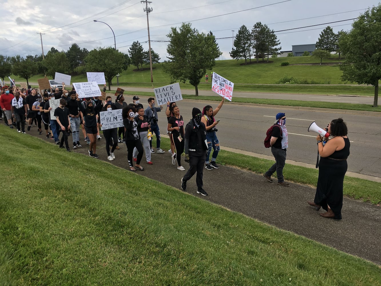 PHOTOS: Demonstrators rally for justice in Beavercreek