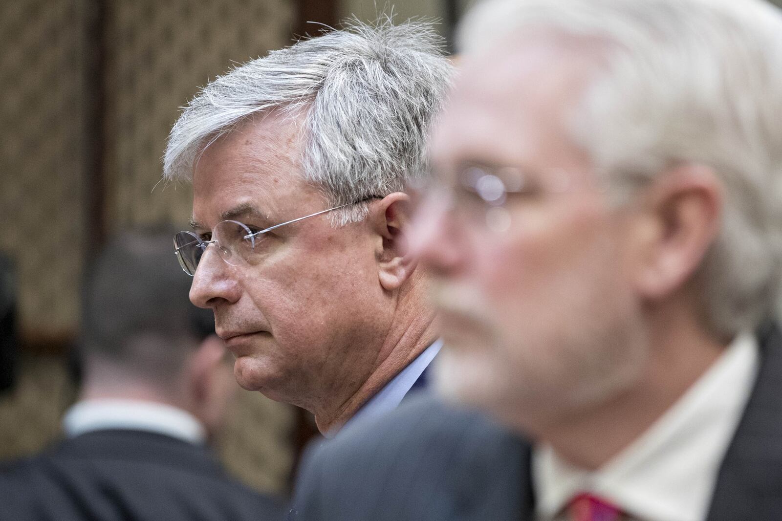 Hubert Joly, Chairman, President and Chief Executive Officer of Best Buy Co., left, and William Rhodes III, Chief Executive Officer of AutoZone Inc., attend a listening session with President Donald Trump and the Retail Industry Leaders Association in the Roosevelt Room of the White House on Feb. 15, 2017, in Washington, D.C. (Photo by Andrew Harrer-Pool/Getty Images)