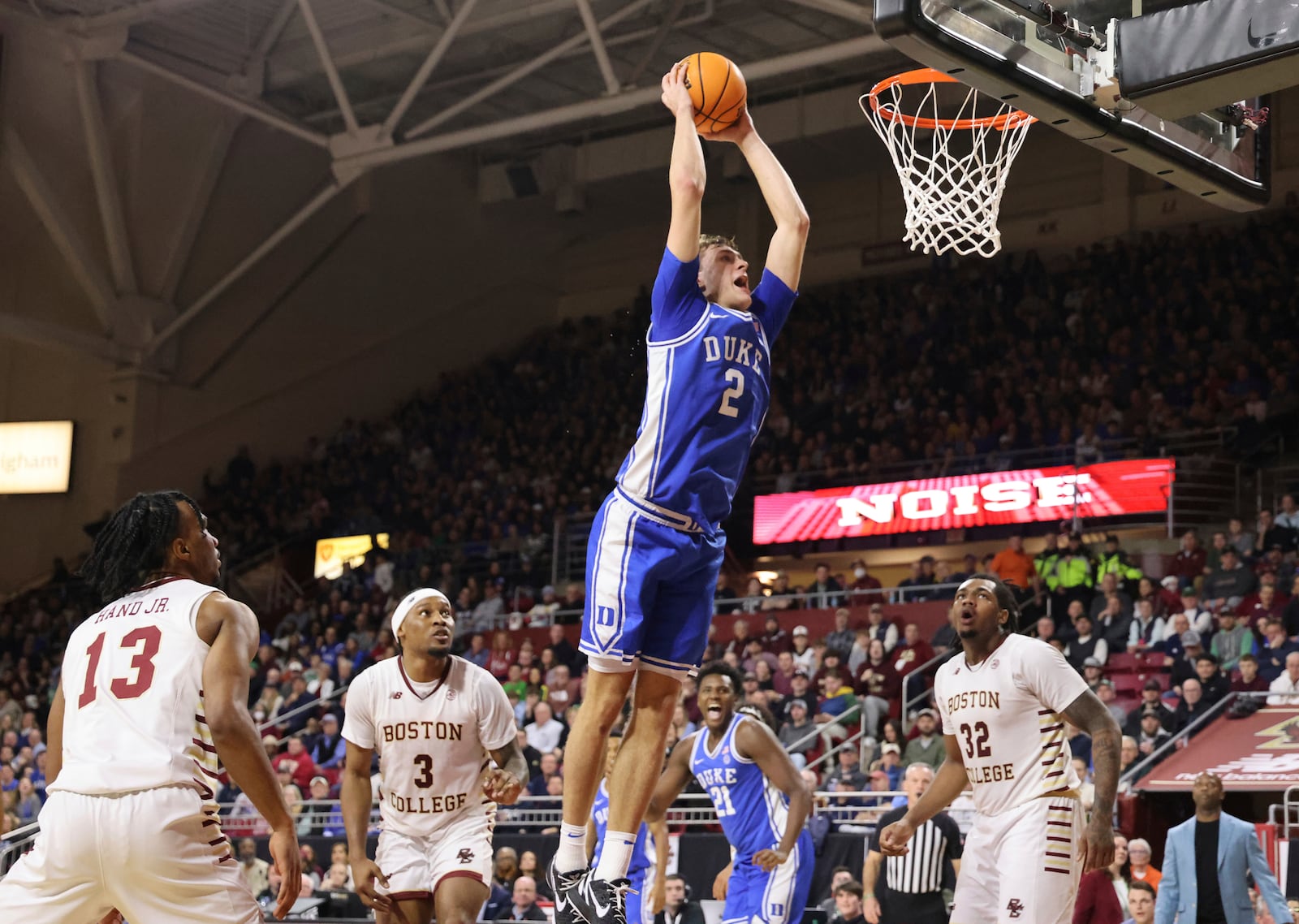 Duke guard Cooper Flagg (2) goes up to dunk during the first half of an NCAA college basketball game against Boston College, Saturday, Jan. 18, 2025, in Boston. (AP Photo/Mark Stockwell)