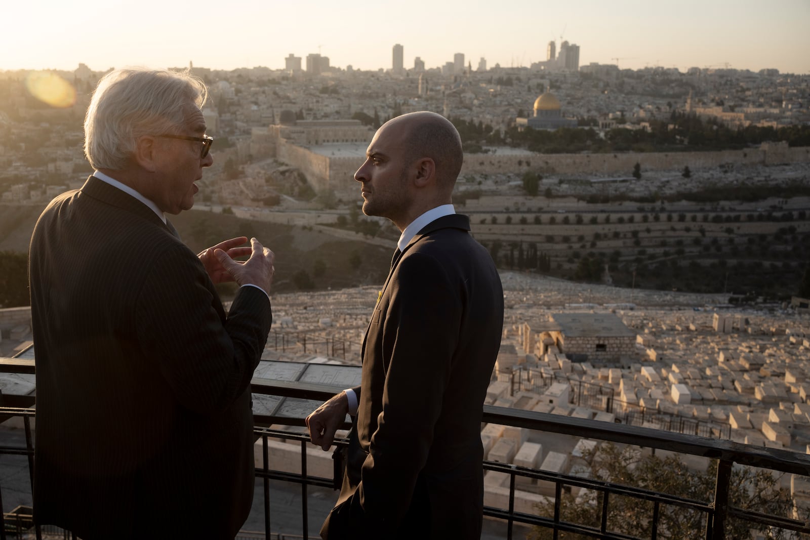 French Foreign Minister Jean-Noël Barrot, right, is briefed by Tor Wennesland overlooking the Old City of Jerusalem from the Mount of Olives during his visit to Jerusalem, Thursday, Nov. 7, 2024. (AP Photo/Maya Alleruzzo)