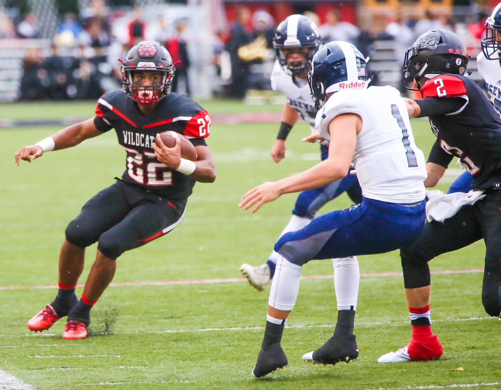 Franklin running back Ryan Montgomery (22) looks for room to run along the sidelines during their game against Edgewood, held at Atrium Stadium in Franklin Community Park, Friday, Sept. 1, 2017. GREG LYNCH / STAFF