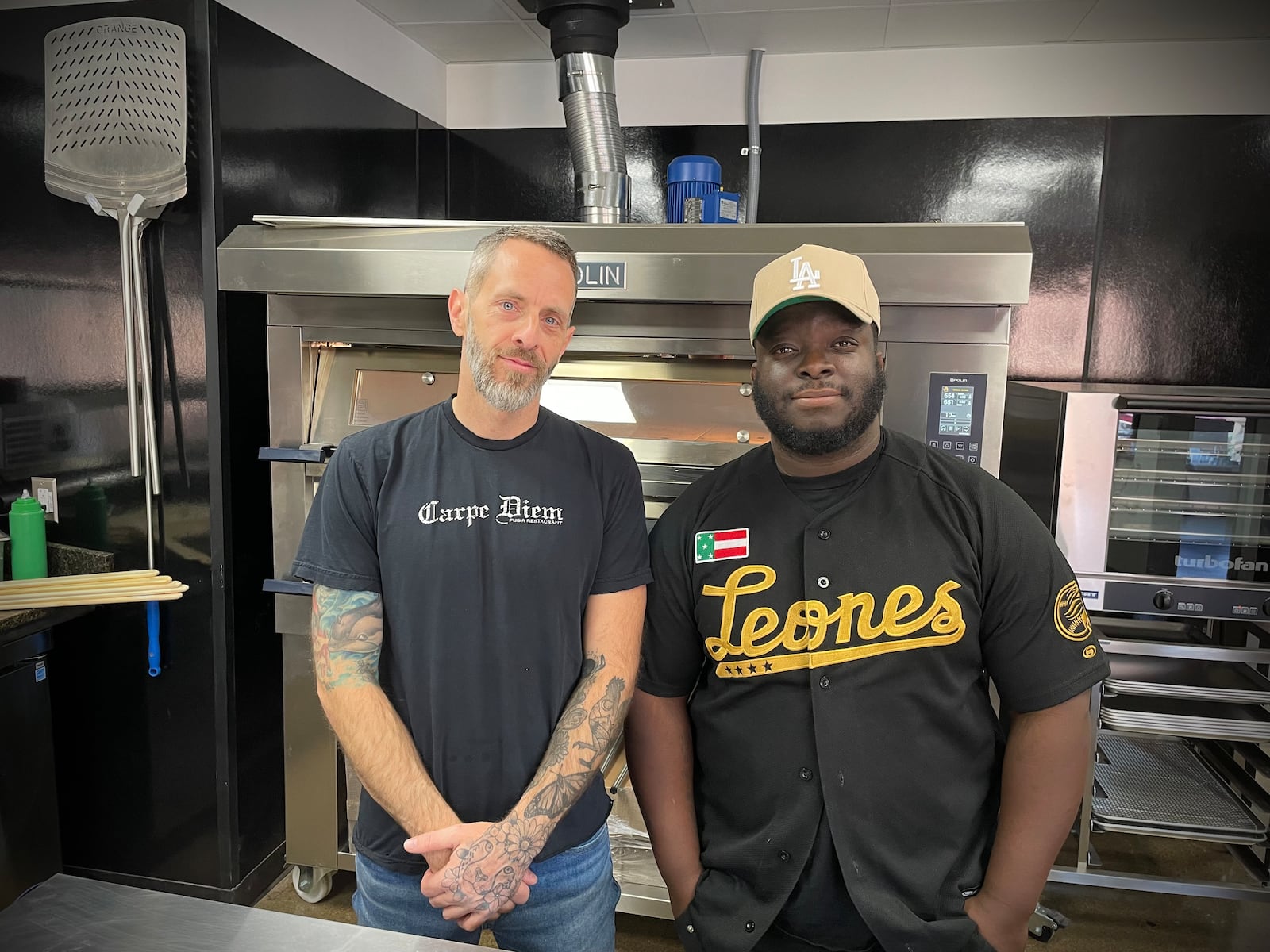 Red Bird Pizza, a new East Coast inspired pizzeria, is located at 18 N. Second St. in Miamisburg. Pictured (left to right) are owners Christian Clothier and Ife Olaore. NATALIE JONES/STAFF