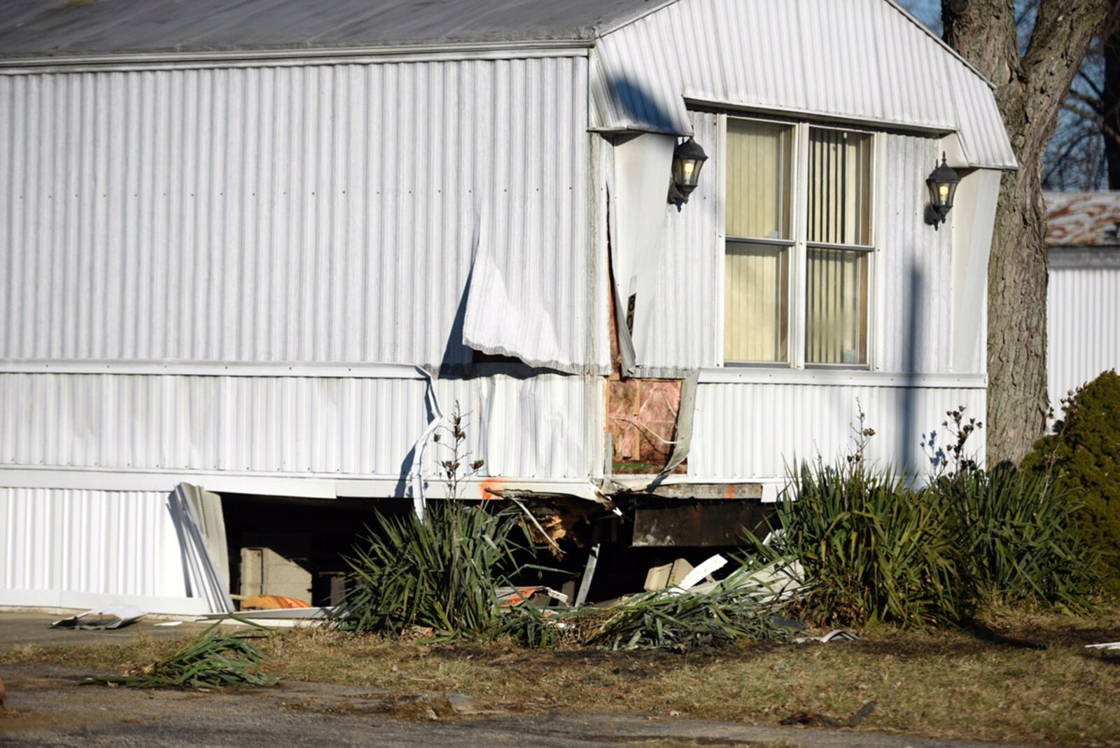 The driver of a vehicle that crashed into this mobile home in the Riverside Village Trailer Park was pronounced dead at the scene. NICK GRAHAM/STAFF