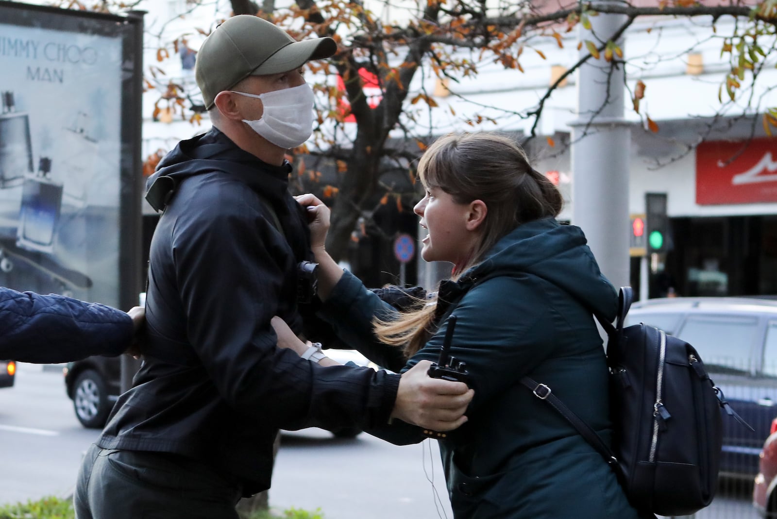 A policeman in civilian dress, left detains a woman during a rally in support of Maria Kolesnikova, and other members of the Coordination Council created by the opposition to facilitate talks with Lukashenko on a transition of power, was detained Monday in the capital of Minsk with two other council members, in Minsk, Belarus, Wednesday, Sept. 9, 2020. The leading opposition candidate in Belarus' disputed presidential election said Wednesday that the political tension in her country should be solved internally, by the Belarusian people, but she did not exclude the need for future international mediation. (AP Photo)