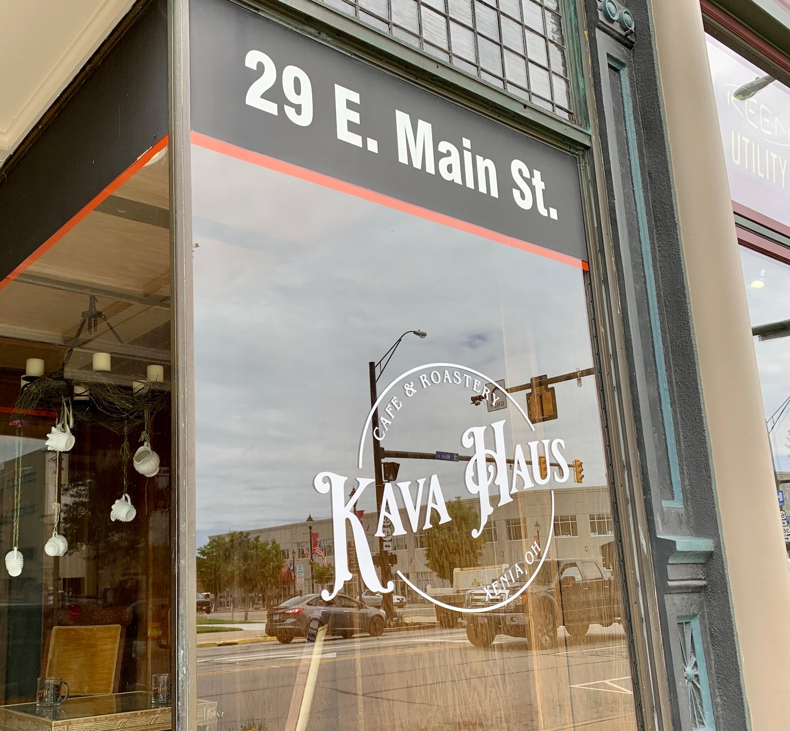 Photo of storefront with Kava Haus logo and address: 29 E Main St. Xenia