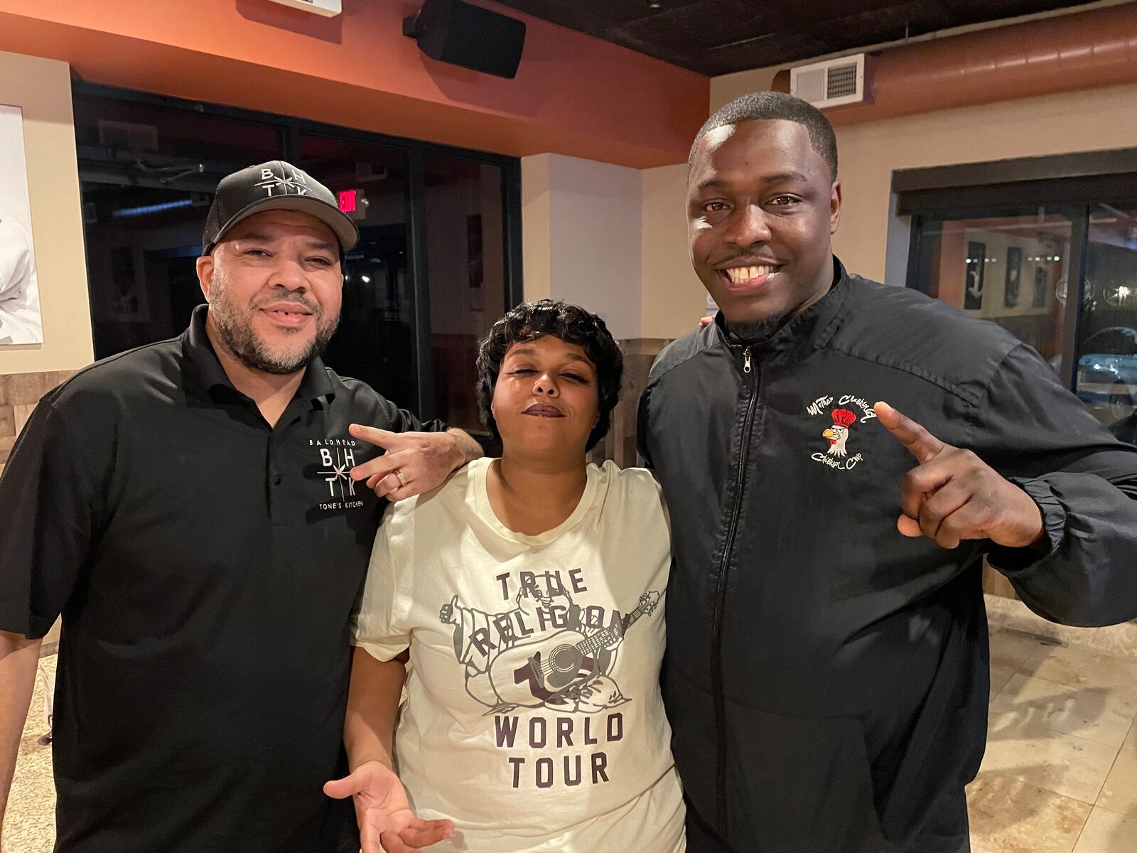 The Wing Warz Competition is from 2 to 7 p.m. at Bleachers Sport Bar and Grill, located at 4317 Linden Ave. in Riverside. Pictured (left to right) is Anthony Mitchell, Devanna Washington and Michael Baxter. NATALIE JONES/STAFF