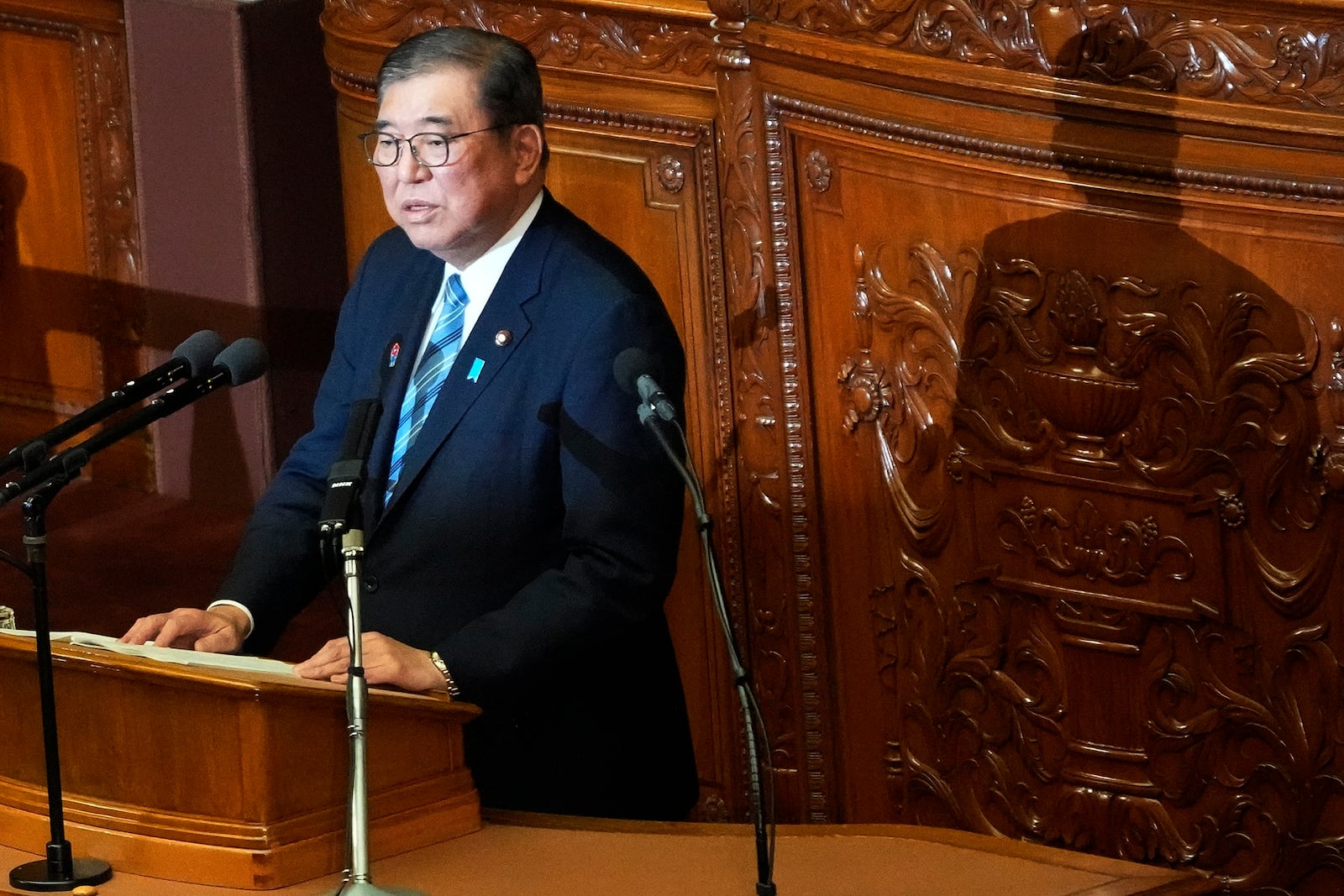 Japan's Prime Minister Shigeru Ishiba delivers a policy speech marking the start of this year's parliamentary session in Tokyo, Friday, Jan. 24, 2025. (AP Photo/Eugene Hoshiko)