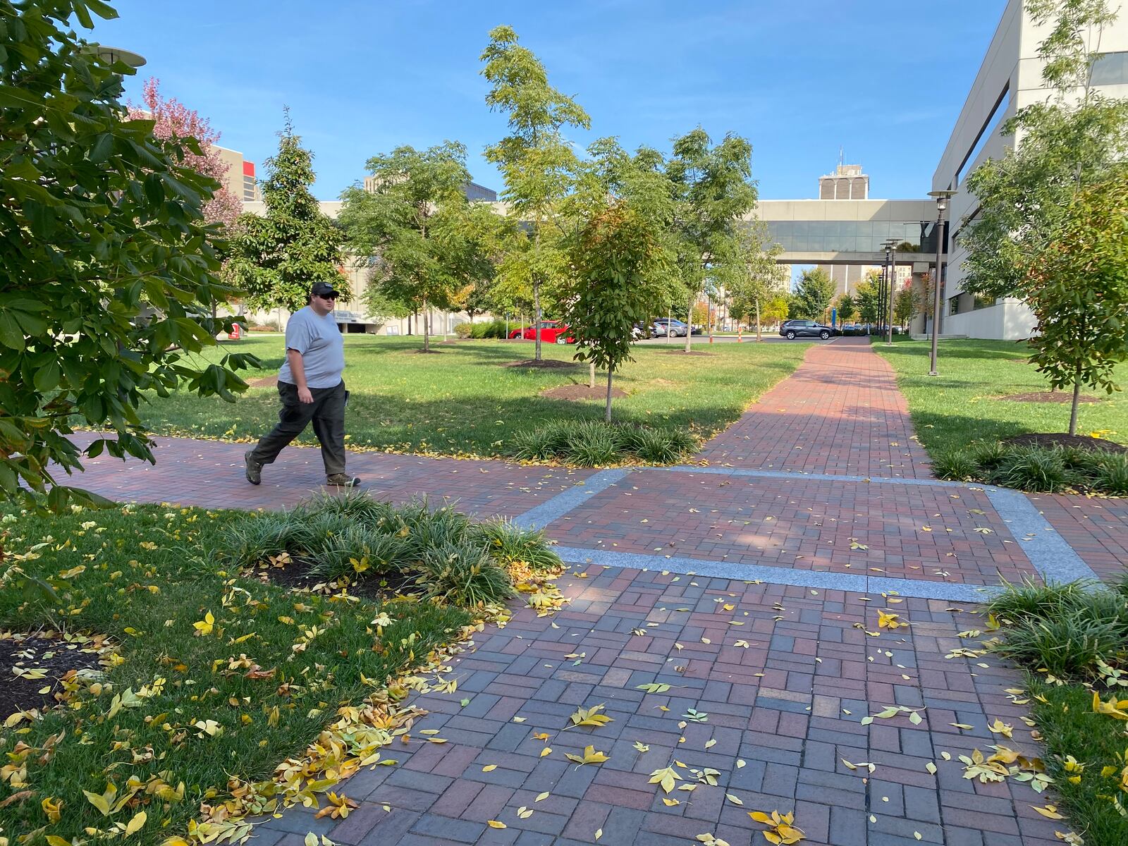 A person walks across campus at Sinclair Community College on Tuesday, Oct. 11. Eileen McClory / staff