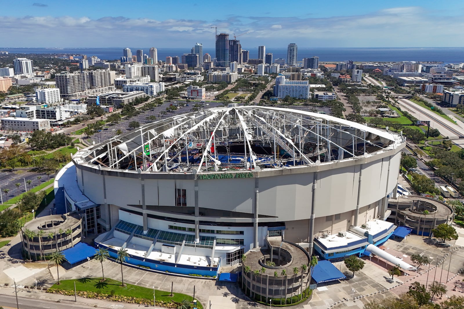 The roof of the Tropicana Field is damaged the morning after Hurricane Milton hit the region, Thursday, Oct. 10, 2024, in St. Petersburg, Fla. (AP Photo/Mike Carlson)