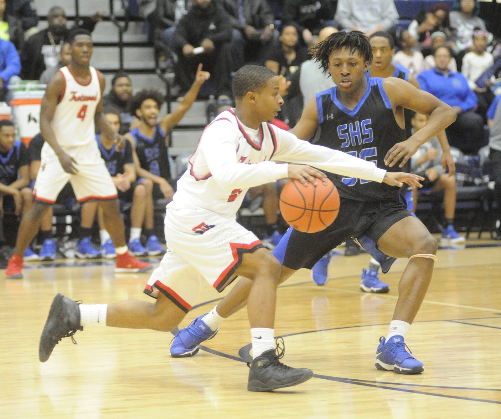 Jovaughn Chapman of Trotwood takes on a South defender. Trotowod-Madison defeated Columbus South 79-60 in a boys high school basketball d-II regional semifinal at Fairmont’s Trent Arena in Kettering on Thur., March 15, 2018. MARC PENDLETON / STAFF