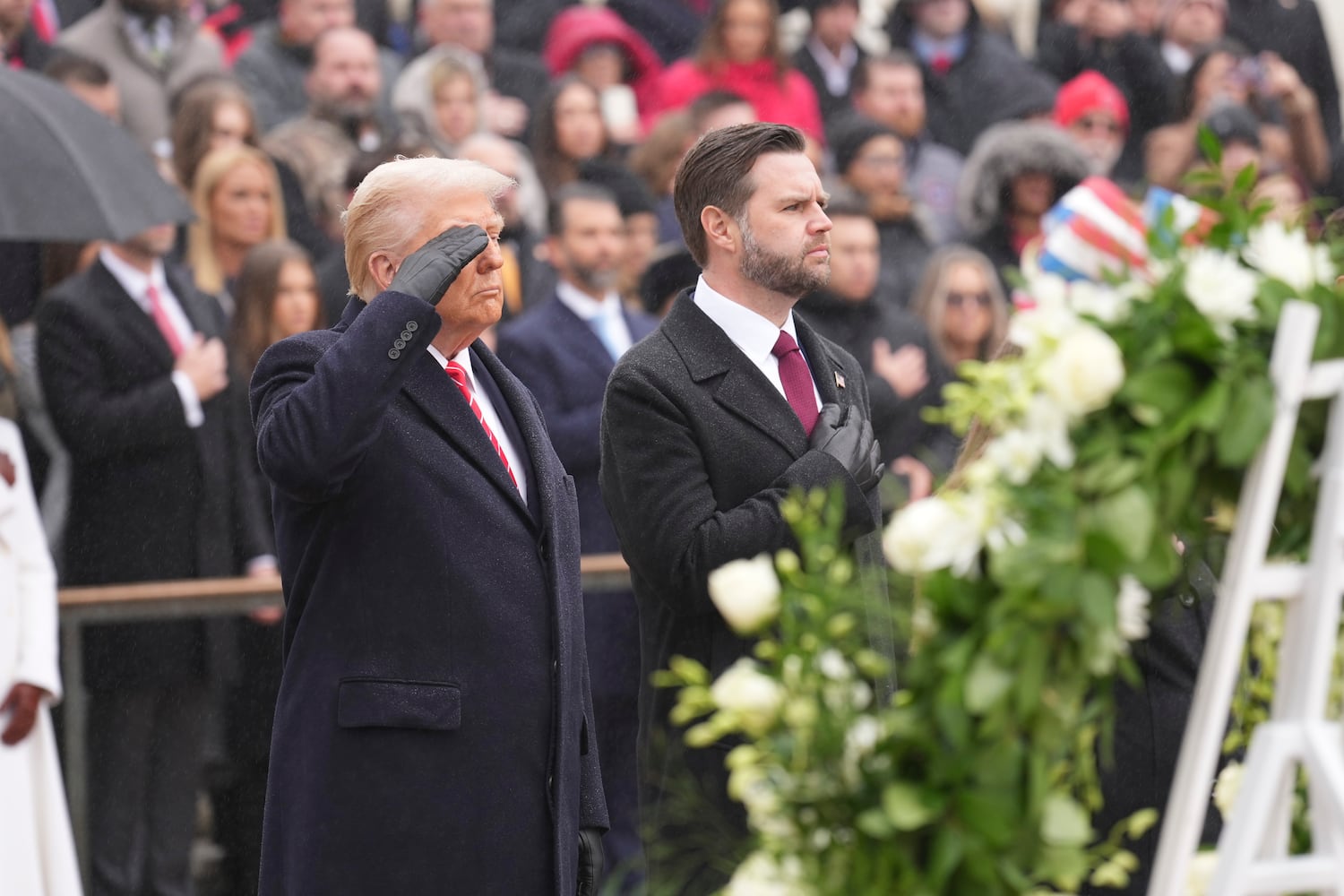 President-elect Donald Trump and Vice President-elect JD Vance attend a wreath-laying ceremony at Arlington National Cemetery, in Arlington, Va., on Sunday, Jan. 19, 2025. (Doug Mills/The New York Times)