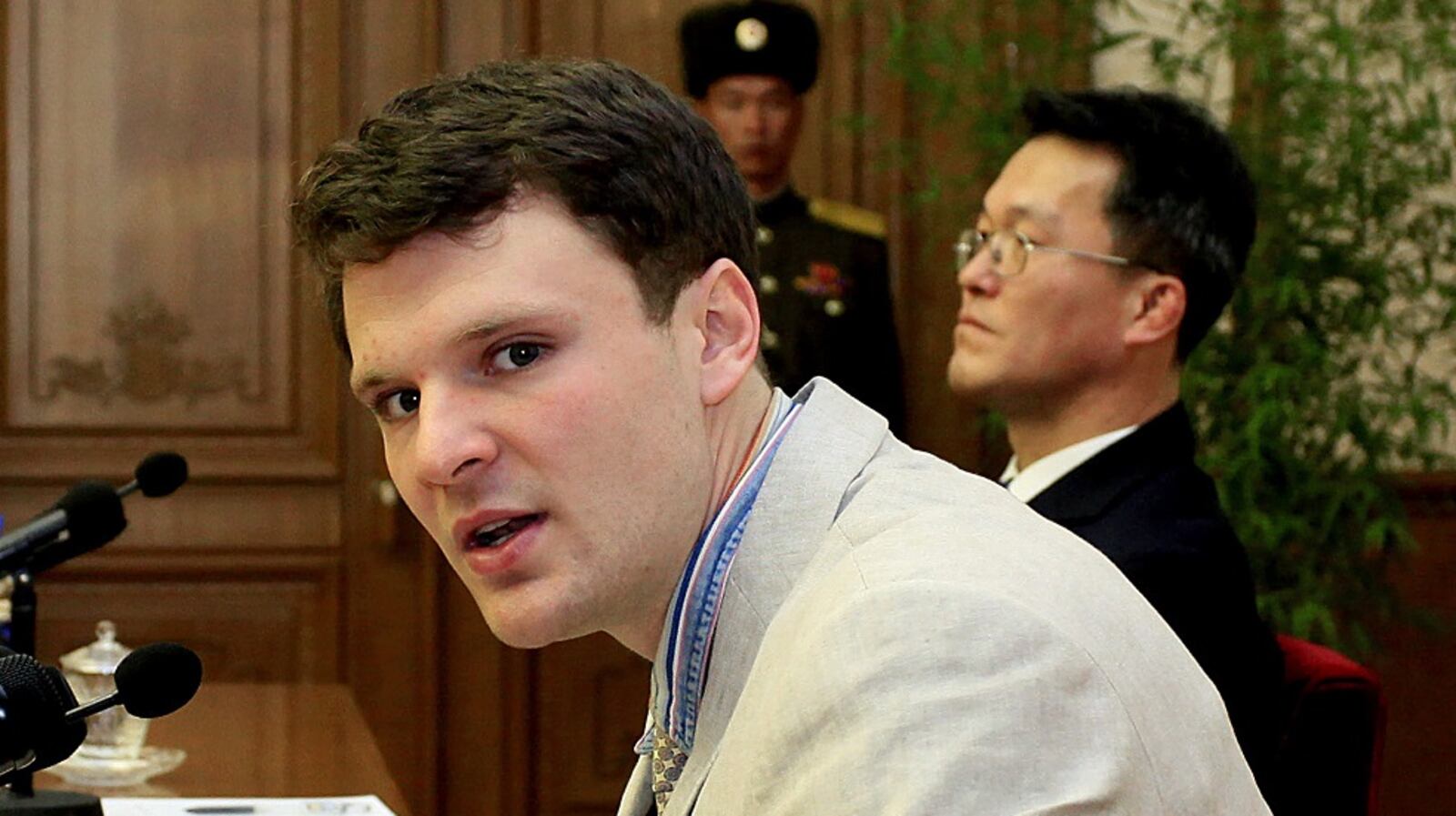 FILE - In this Feb. 29, 2016 file photo, American student Otto Warmbier speaks as Warmbier is presented to reporters in Pyongyang, North Korea.  U.S. officials say the Trump administration will ban American citizens from traveling to North Korea following the death of university student Otto Warmbier, who passed away after falling into a coma into a North Korean prison. (AP Photo/Kim Kwang Hyon)