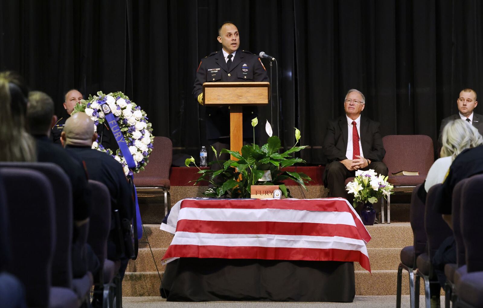 Franklin Police Chief Adam Colon speaks during a memorial service for Franklin Police K9, Fury, Thursday, Nov. 16, 2023 at New Vine Community Church. The ceremony was followed by a procession of Police  vehicles from multiple agencies through Franklin. Fury, a German shepherd, was killed when a wrong way driver struck his police cruiser. His handler, officer Alex Butler, and fellow officer Eric Miller had minor injuries. NICK GRAHAM/STAFF