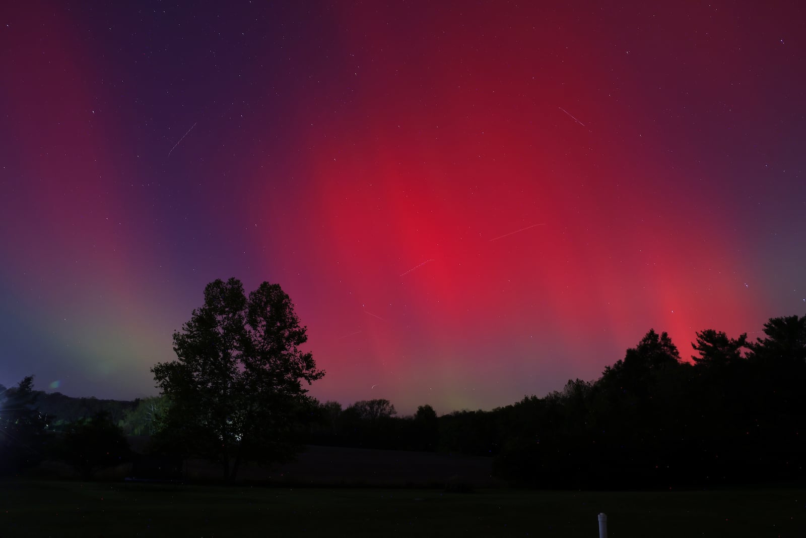 The Aurora Borealis, or northern lights, was visible from Ohio Thursday, Oct. 10, 2024. This was in Madison Township in Butler County. NICK GRAHAM/STAFF