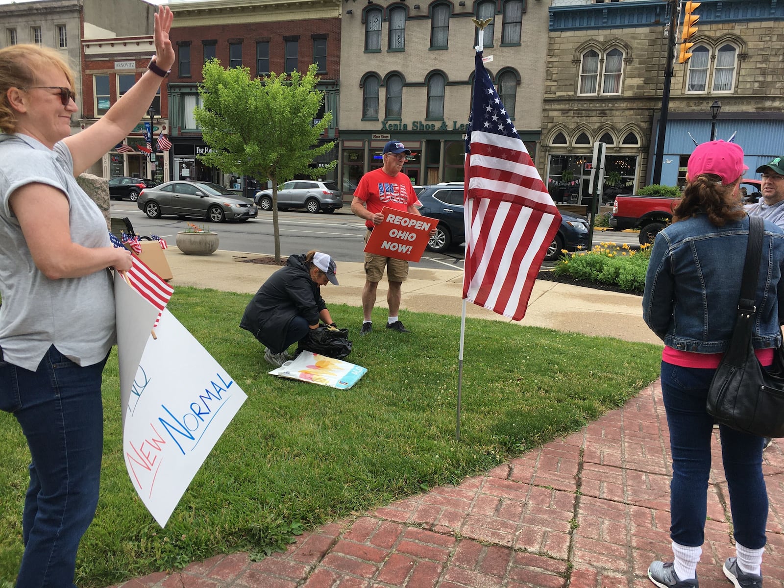 A small group of demonstrators gathered Saturday, June 13, outside the Greene County Courthouse in Xenia to rally for a return to school in the fall without restrictions. This is one of a series of rallies happening across the state. TOM GNAU/STAFF