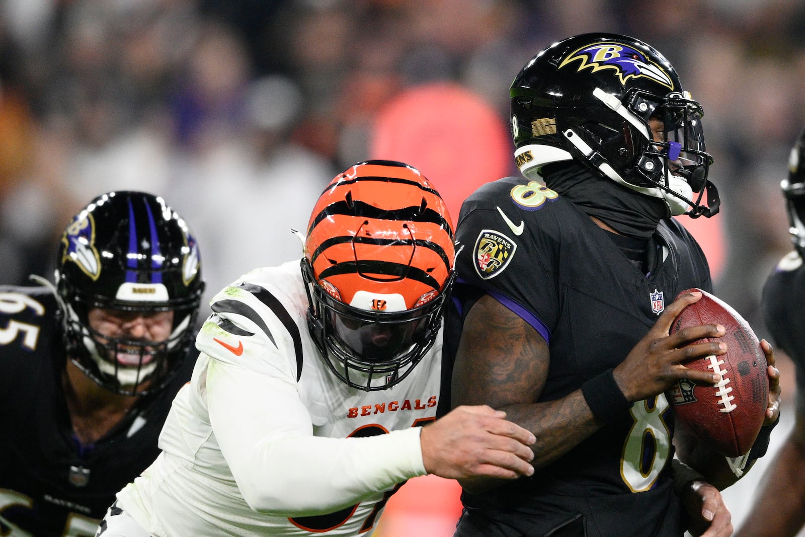 Cincinnati Bengals defensive end Trey Hendrickson (91) sacks Baltimore Ravens quarterback Lamar Jackson (8) in the first half of an NFL football game in Baltimore, Thursday, Nov. 16, 2023. (AP Photo/Nick Wass)