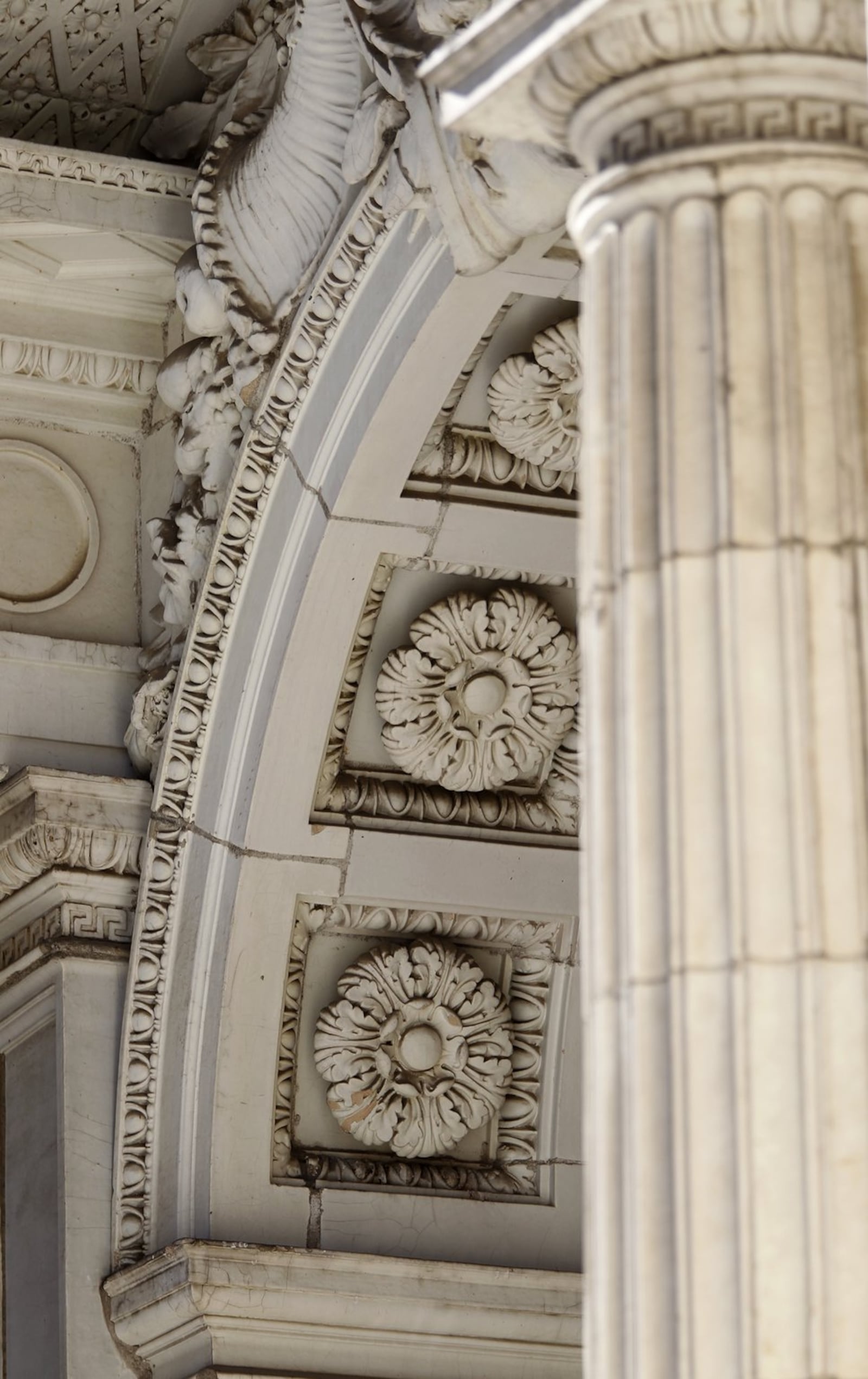 Arched stone with decorated intrados frame the Dayton Daily News main doorway that opened to journalists and the community for decades. LISA POWELL / STAFF