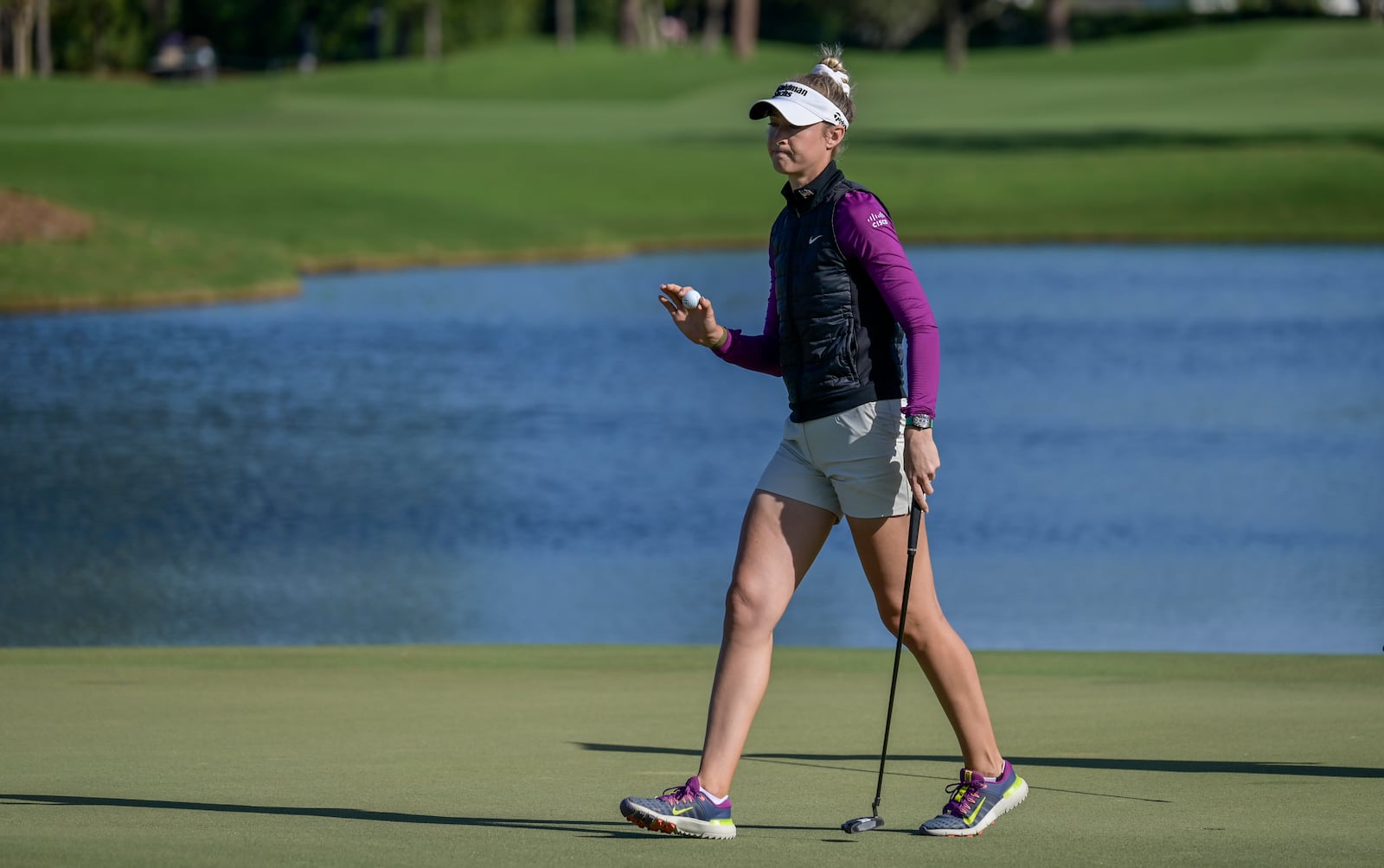 Nelly Korda walks across the ninth green during the first round of the LPGA Annika golf tournament at Pelican Golf Club, Thursday, Nov. 14, 2024, in Belleair, Fla. (AP Photo/Steve Nesius)