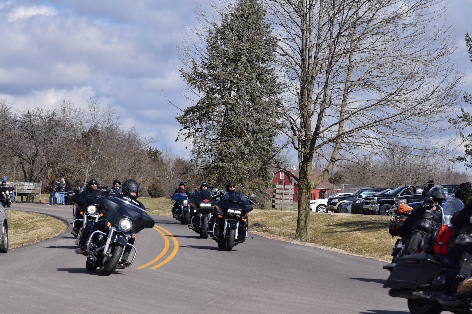 PHOTOS: Thousands of Outlaws attend motorcycle gang leaders funeral at Montgomery County Fairgrounds.