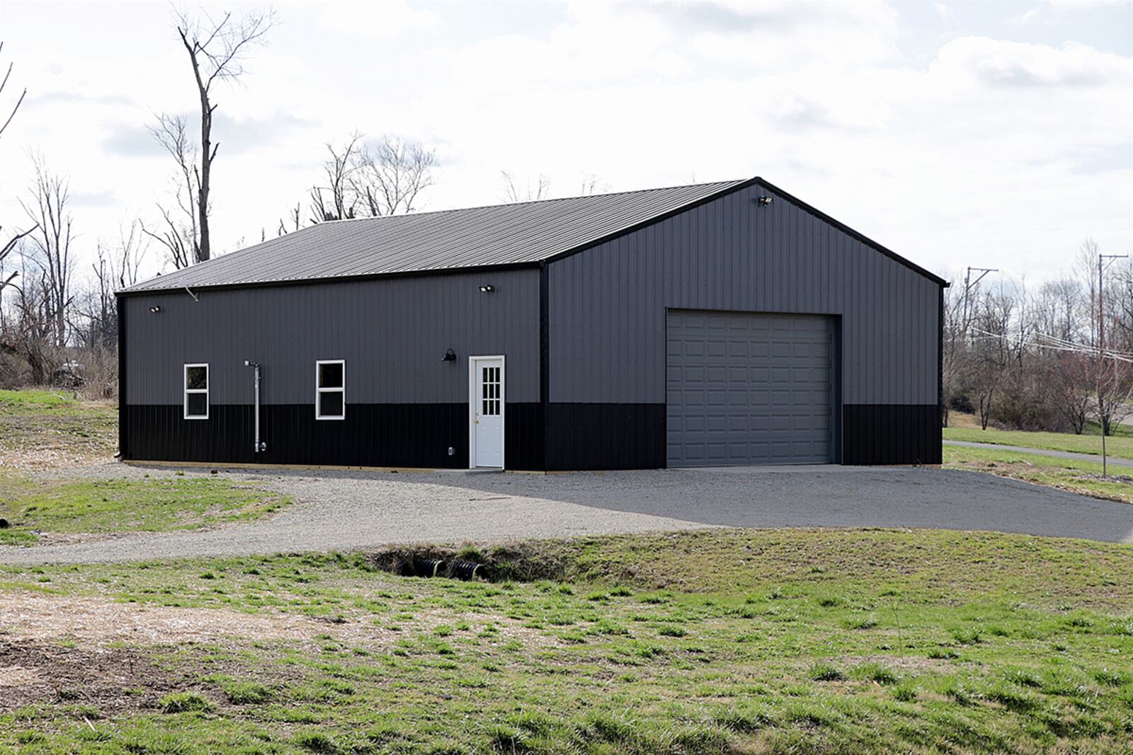 In addition to the main residence, the near 6-acre property includes a garden shed, a storage shed with an overhead door, and a recently built 36-by-48-foot pole barn with overhead door, concrete flooring, electric and heat. CONTRIBUTED PHOTO BY KATHY TYLER