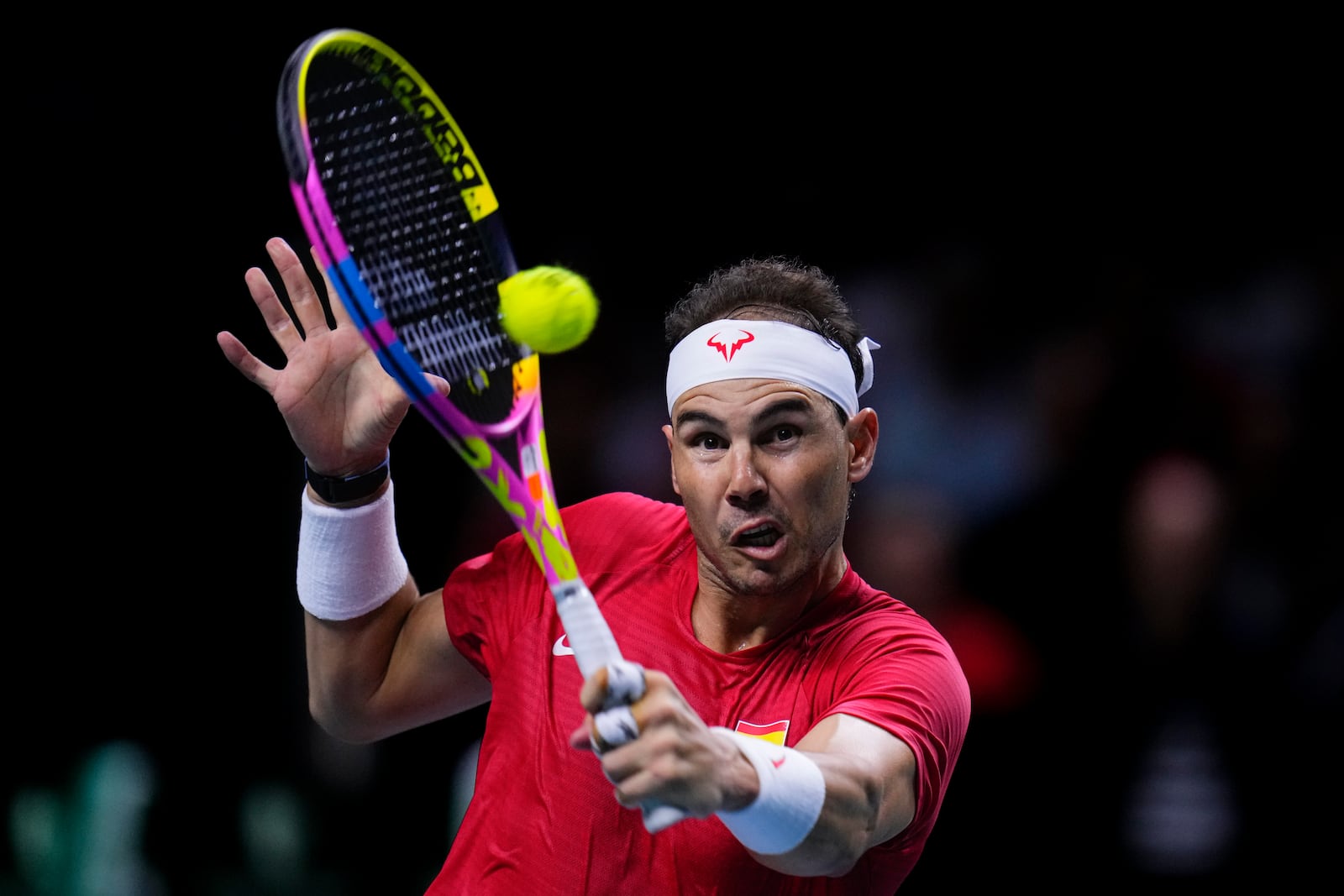 Spain's tennis player Rafael Nadal competes against Netherlands' Botic Van De Zandschulp during a Davis Cup quarterfinal match at Martin Carpena Sports Hall in Malaga, southern Spain, on Tuesday, Nov. 19, 2024. (AP Photo/Manu Fernandez)