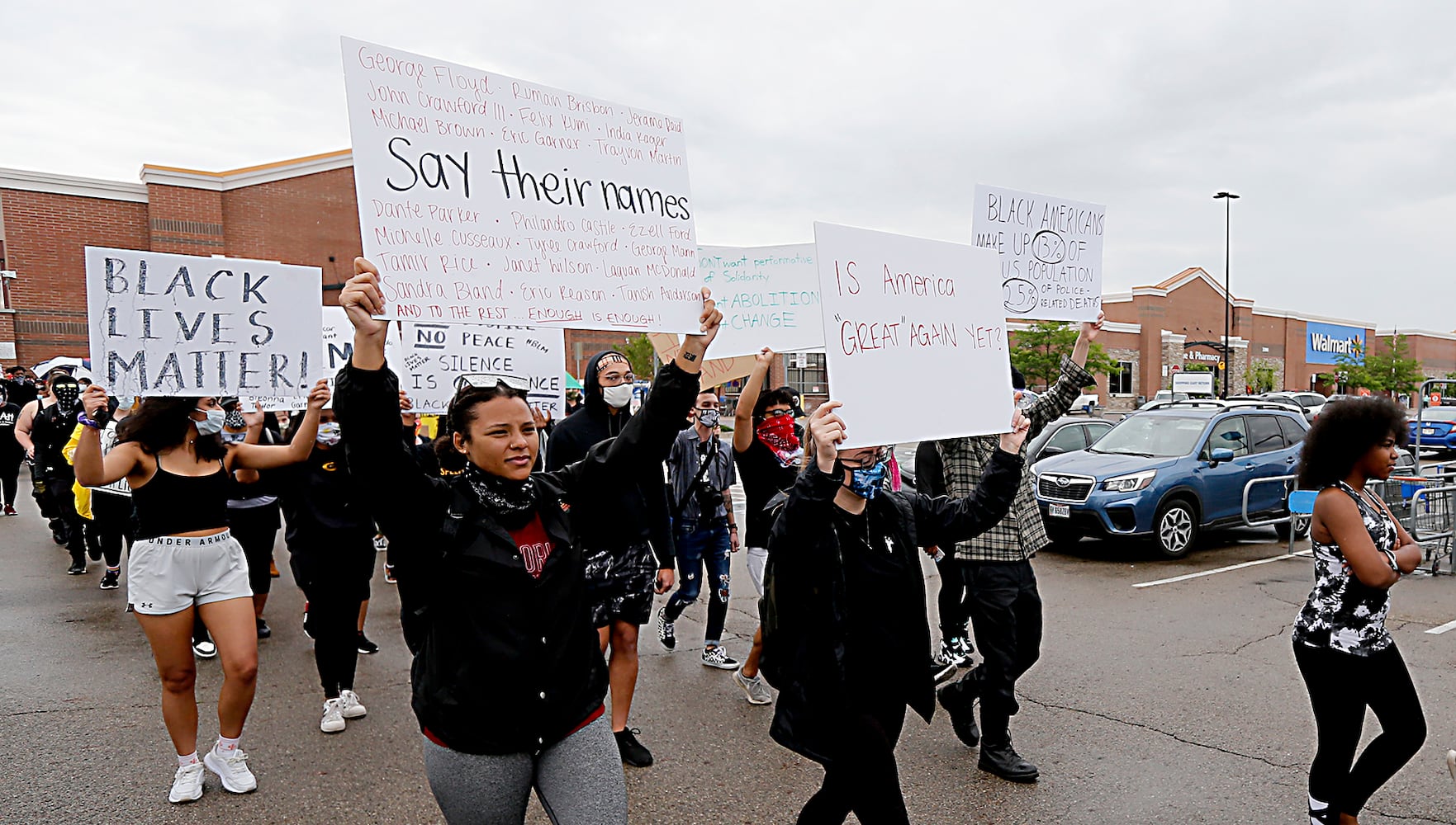 PHOTOS: Demonstrators rally for justice in Beavercreek