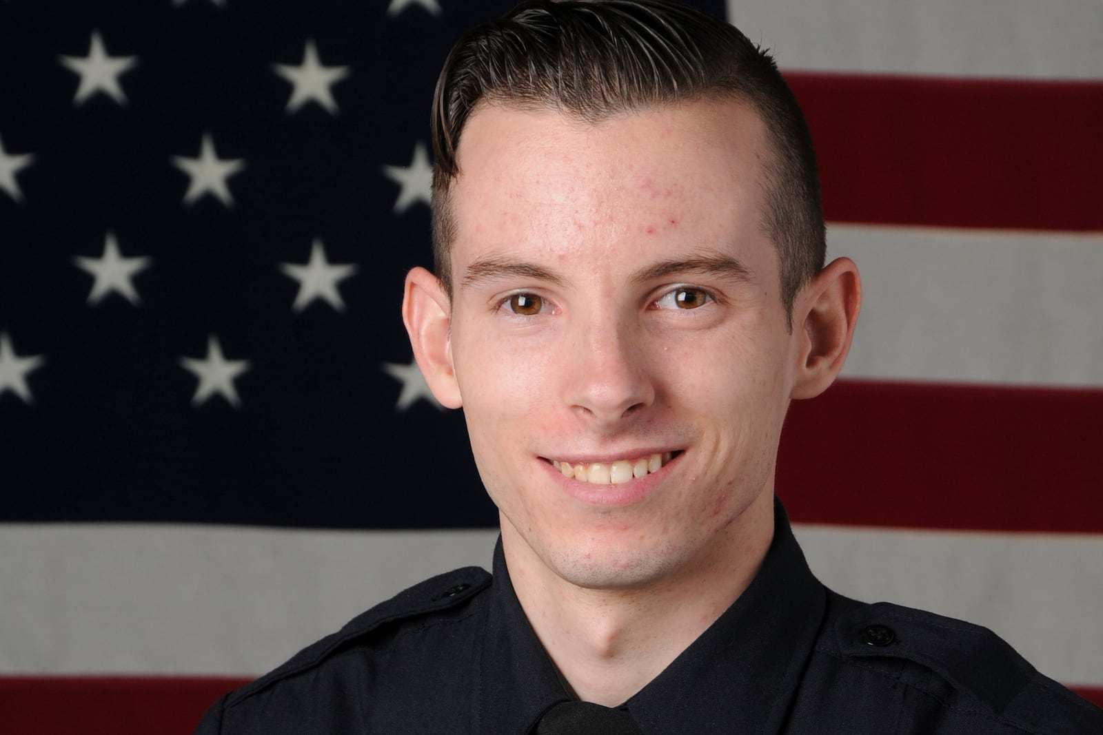 This undated photo provided by the Denver Police Department shows Andrew Duarte who served as a Denver police officer from 2017 to 2022. (Denver Police Department via AP)