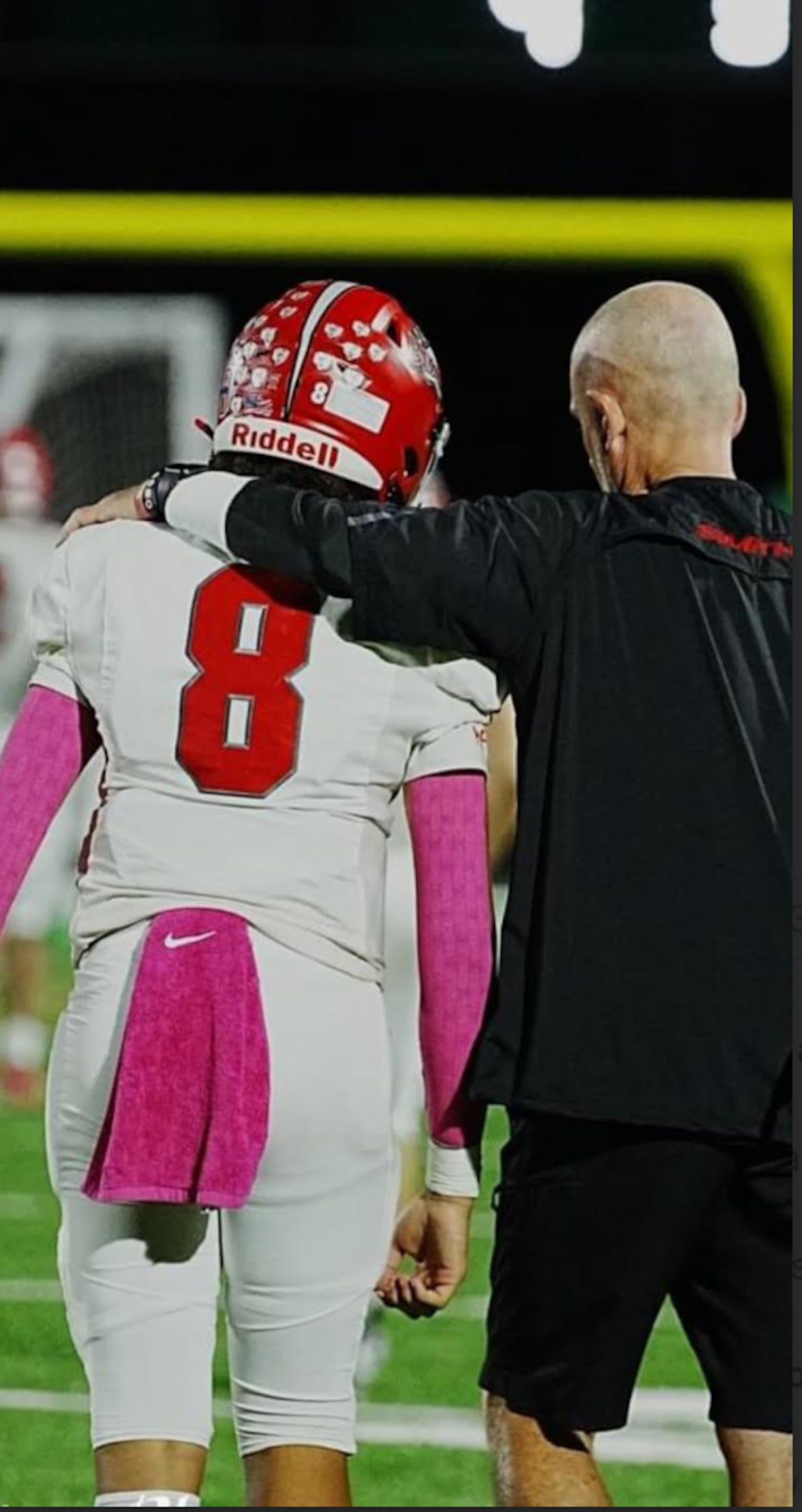 Northridge football coach Bob Smith with Polar Bears junior quarterback Dorryen Davis during a game this season. CONTRIBUTED