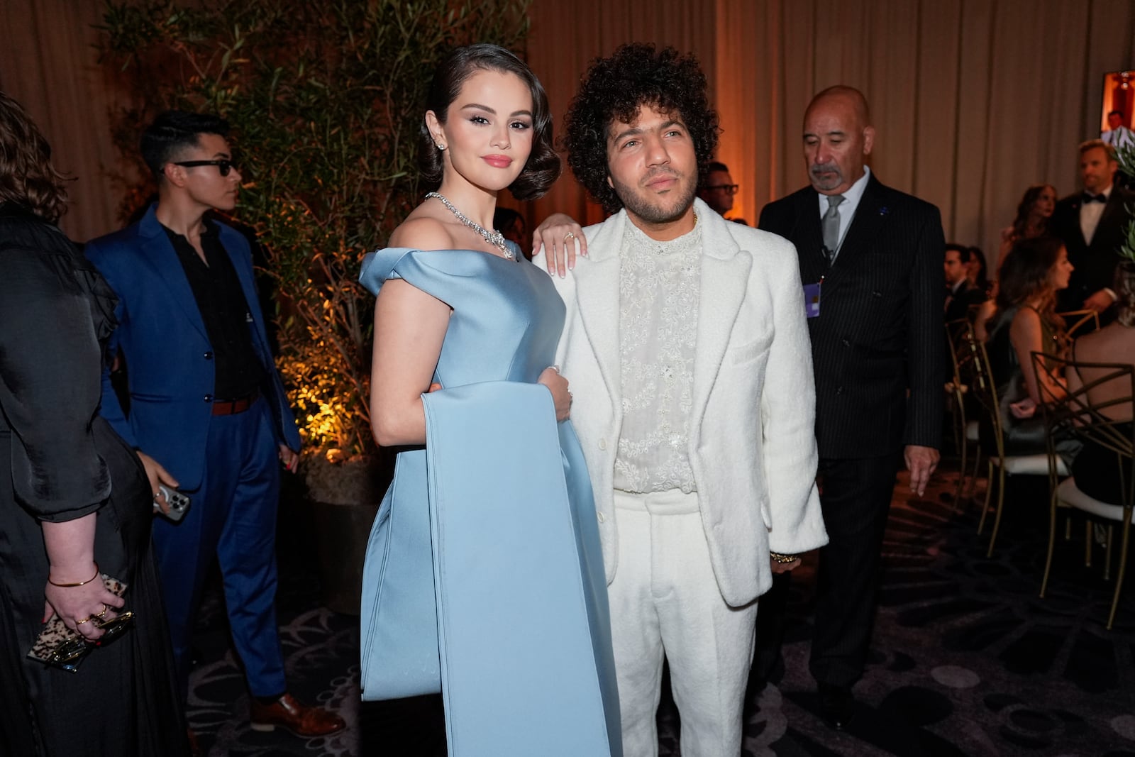 Selena Gomez, left, and Benny Blanco arrive at the 82nd Golden Globes on Sunday, Jan. 5, 2025, at the Beverly Hilton in Beverly Hills, Calif. (AP Photo/Chris Pizzello)