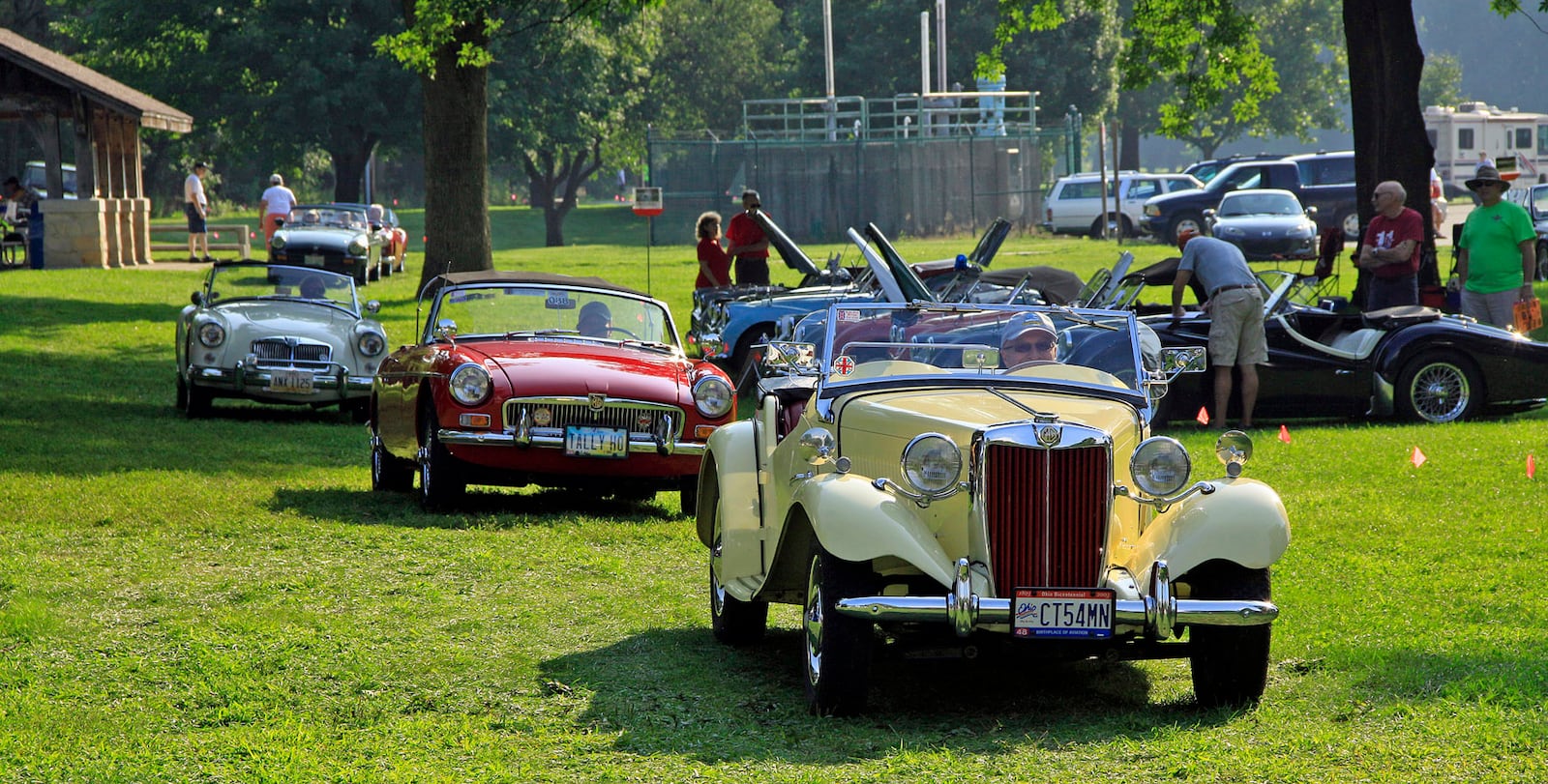 A trio of MG's enters the show field at Eastwood Metro Park for British Car Day, which will be held this year on Aug. 6.  Photograph by Skip Peterson
