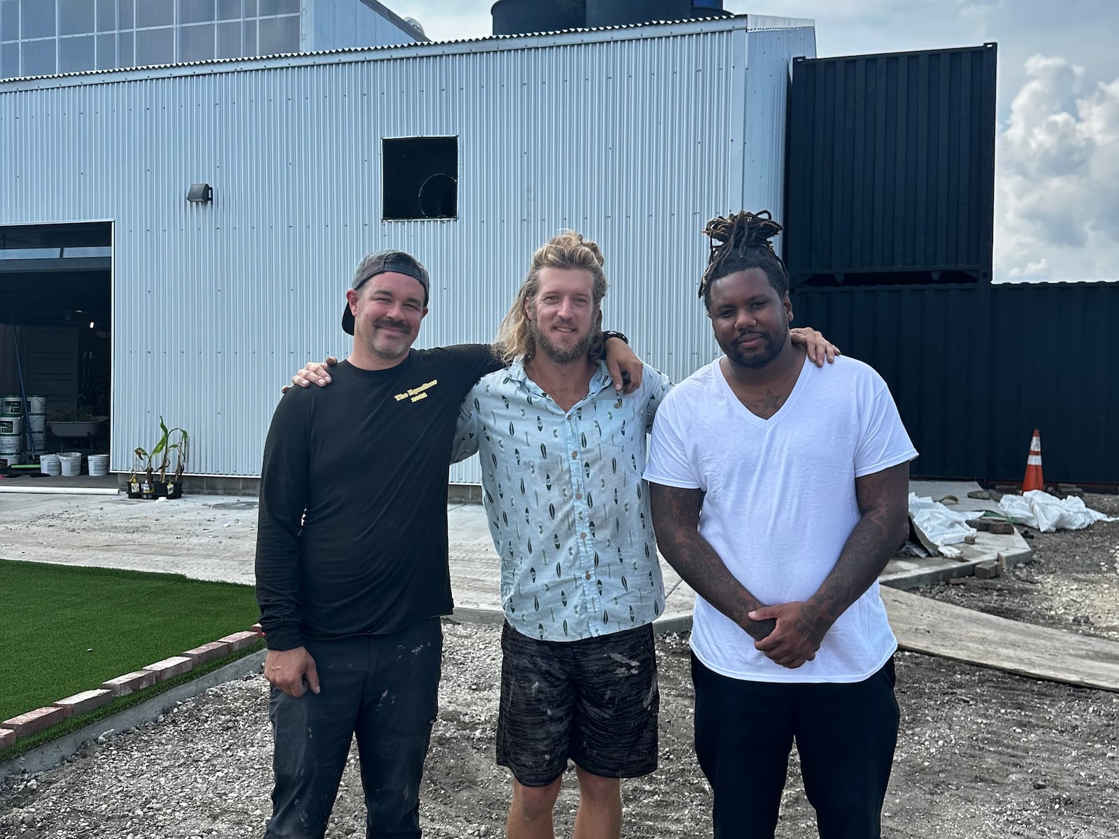 Chef Dane Shipp is opening a new concept at The Silos, a food hall and beer garden expected to open in the fall near 2nd Street Market in downtown Dayton. Pictured (left to right) are food hall owners Shannon Thomas and Wes Hartshorn with Chef Dane Shipp (CONTRIBUTED PHOTO).