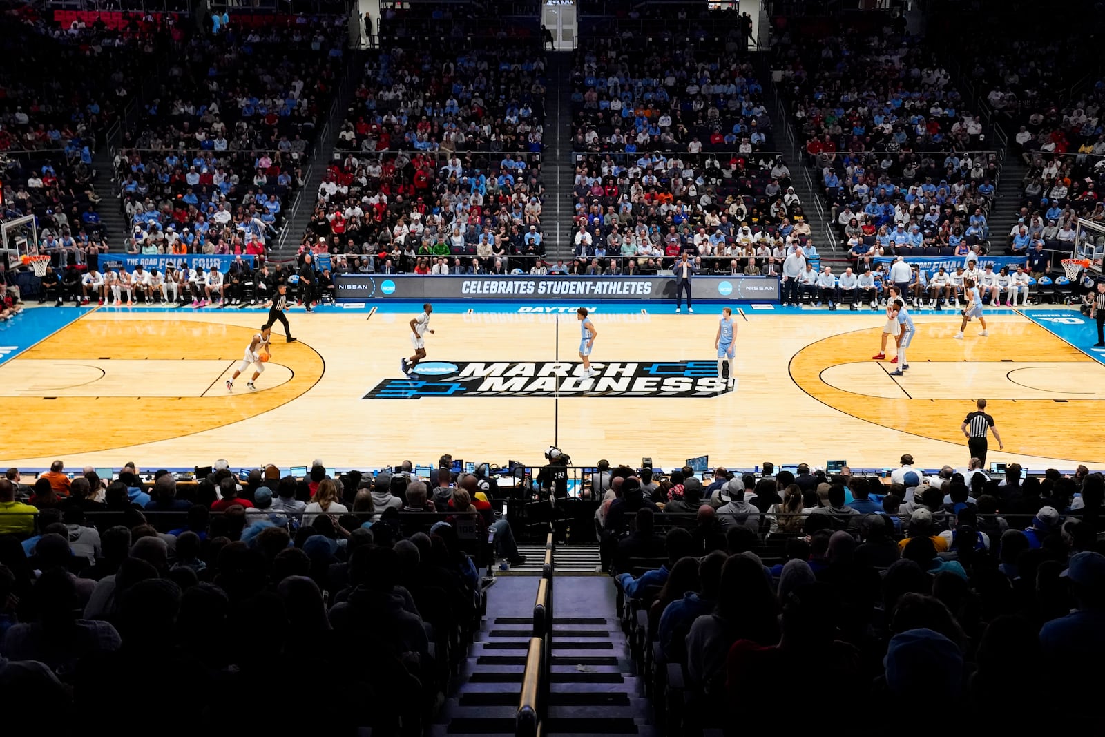 San Diego State guard Nick Boyd dribbles during the first half of a First Four college basketball game against North Carolina in the NCAA Tournament, Tuesday, March 18, 2025, in Dayton, Ohio. (AP Photo/Jeff Dean)