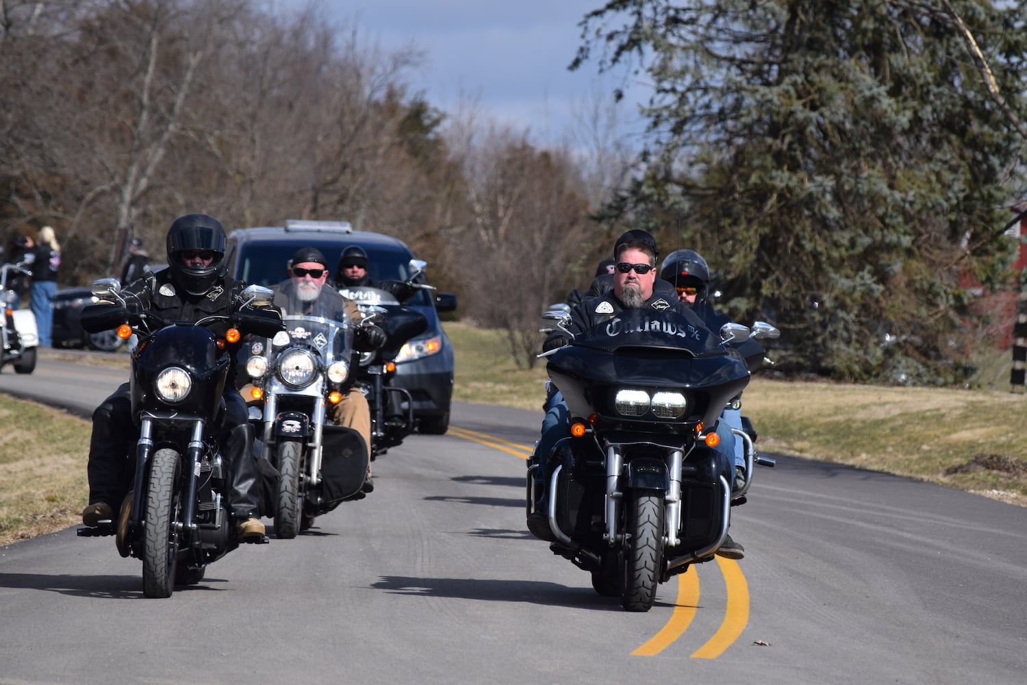 PHOTOS: Thousands of Outlaws attend motorcycle gang leaders funeral at Montgomery County Fairgrounds.