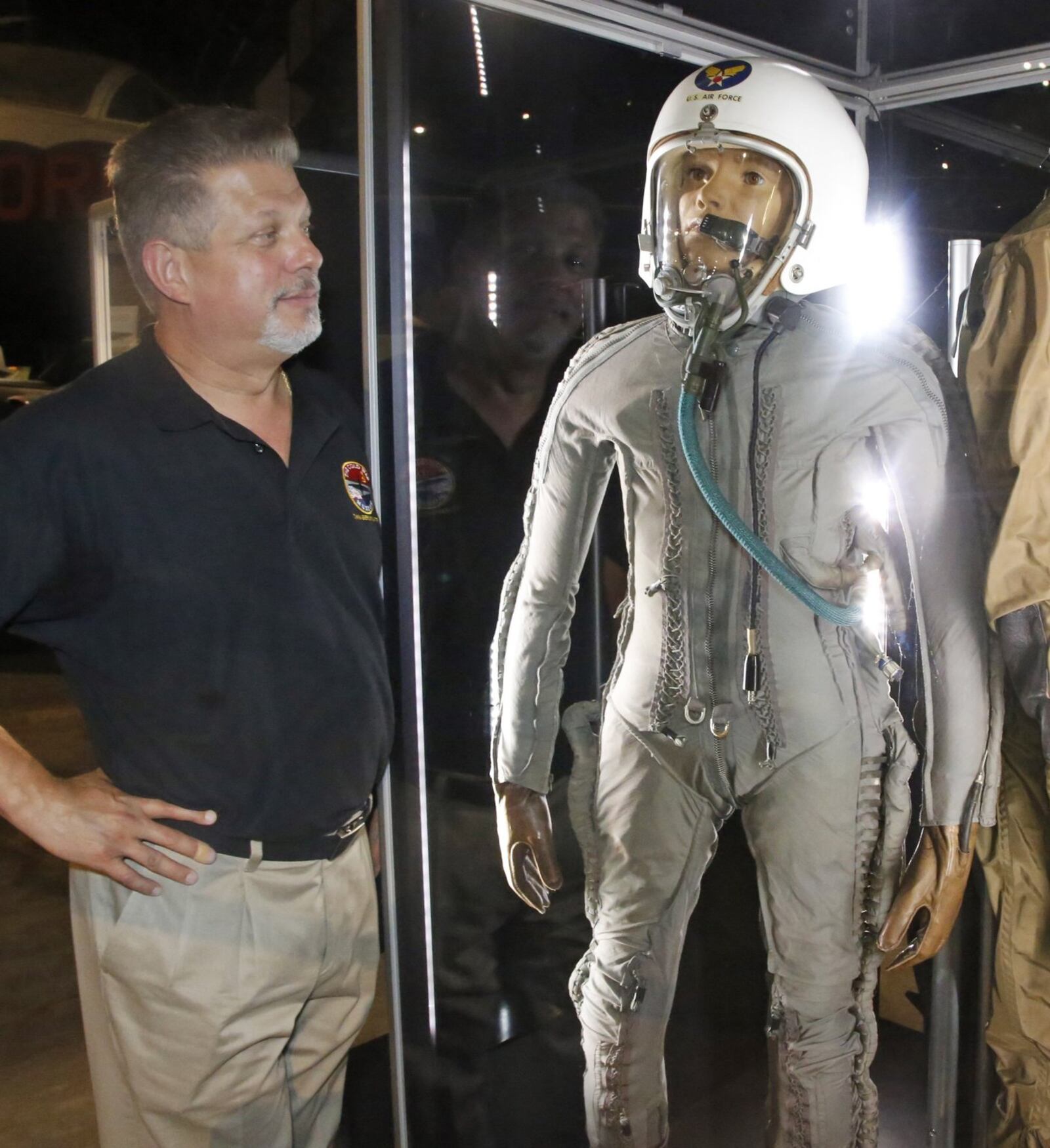 Francis Gary Powers, Jr., son of former U-2 pilot Francis Gary Powers, Sr., observes the type of U-2 pressure suit type his father wore on display at the National Museum of the United States Air Force. Powers, Jr. is speaking at the museum at 3:00 p.m. on Friday, July 21. TY GREENLEES / STAFF