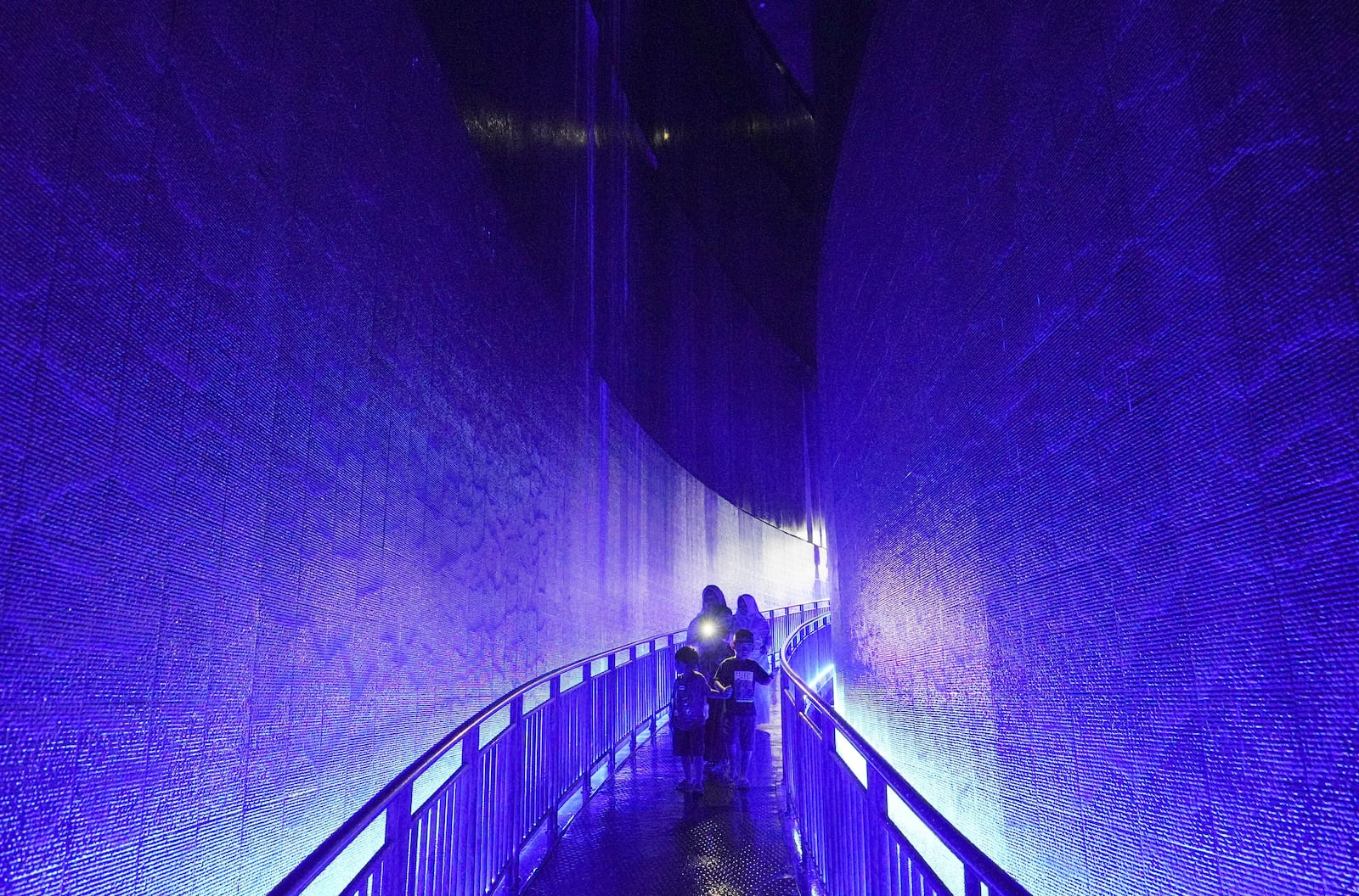 Visitors walks at the Tsunami Museum in Banda Aceh, Aceh province, Indonesia, Saturday, Dec 14, Dec. 15, 2024. (AP Photo/Achmad Ibrahim)