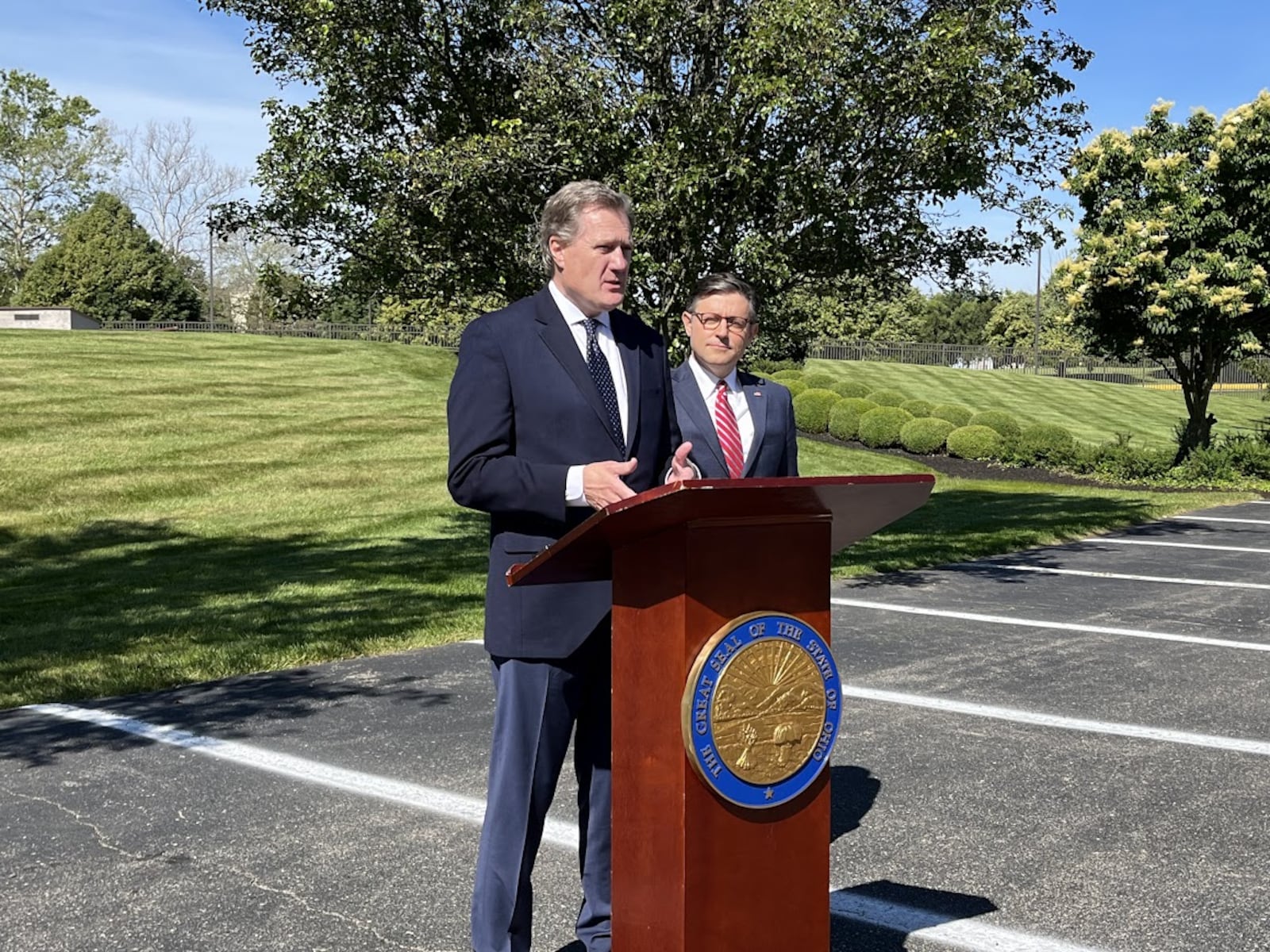 U.S. Rep. Mike Turner, R-Dayton, at the podium, with Speaker of the House Mike Johnson outside the Hope Hotel and Conference Center Friday. THOMAS GNAU/STAFF