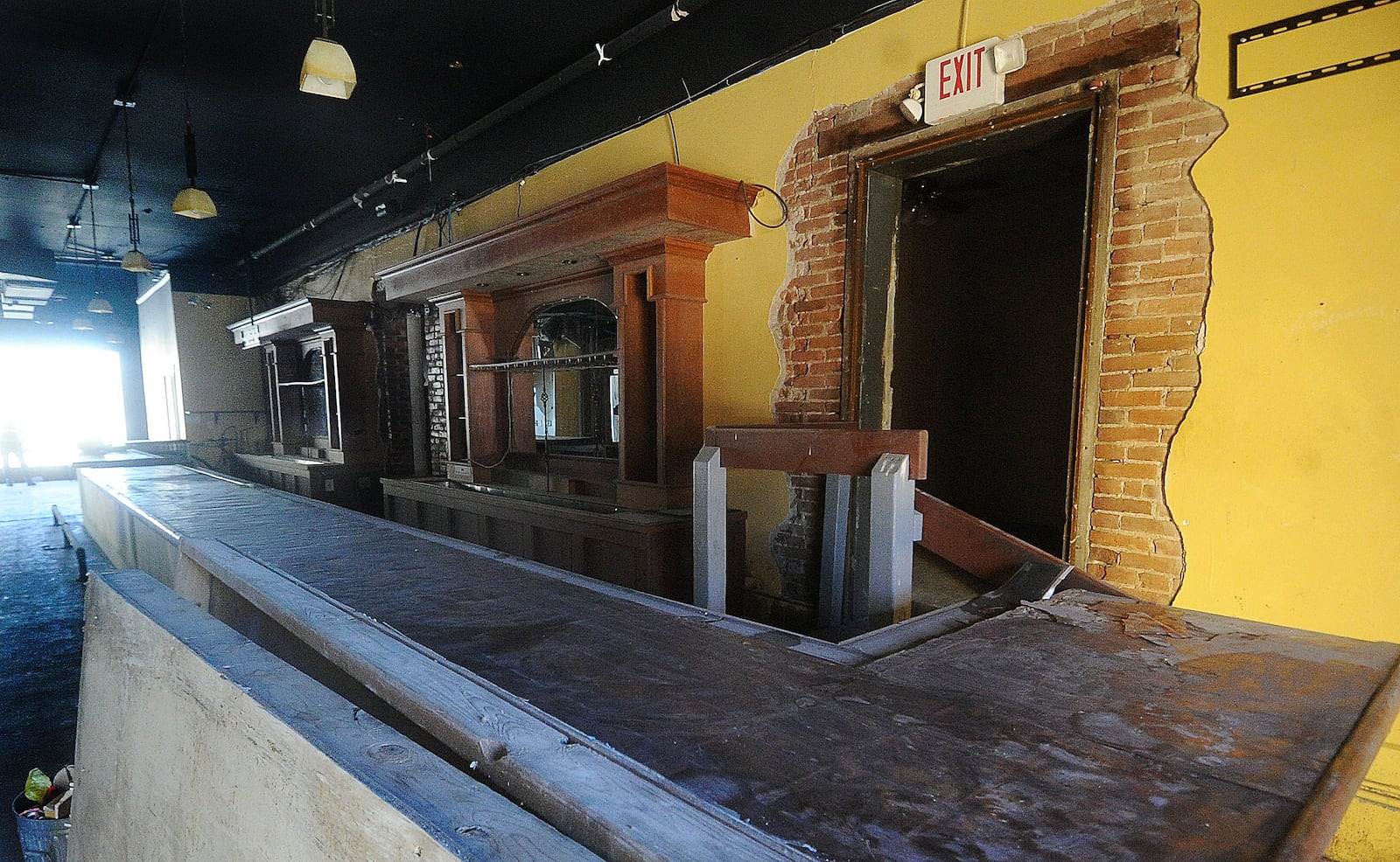 Ben Sutherly gives a tour Wednesday, Feb. 14, 2024 inside the controversial Troy Tavern/IOOF building, which the Troy Historic Preservation Alliance is trying to save. MARSHALL GORBY\STAFF